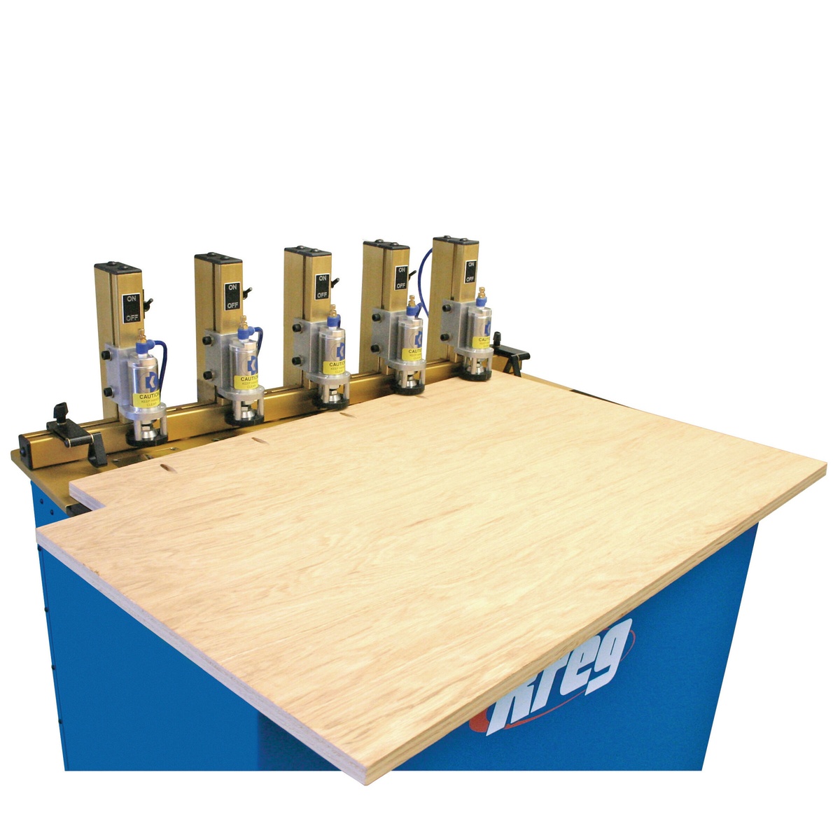Kreg DK5100 Panel-Boring Pocket Hole-Machine drilling pocket holes in a plywood panel during cabinet part production on a shop workstation