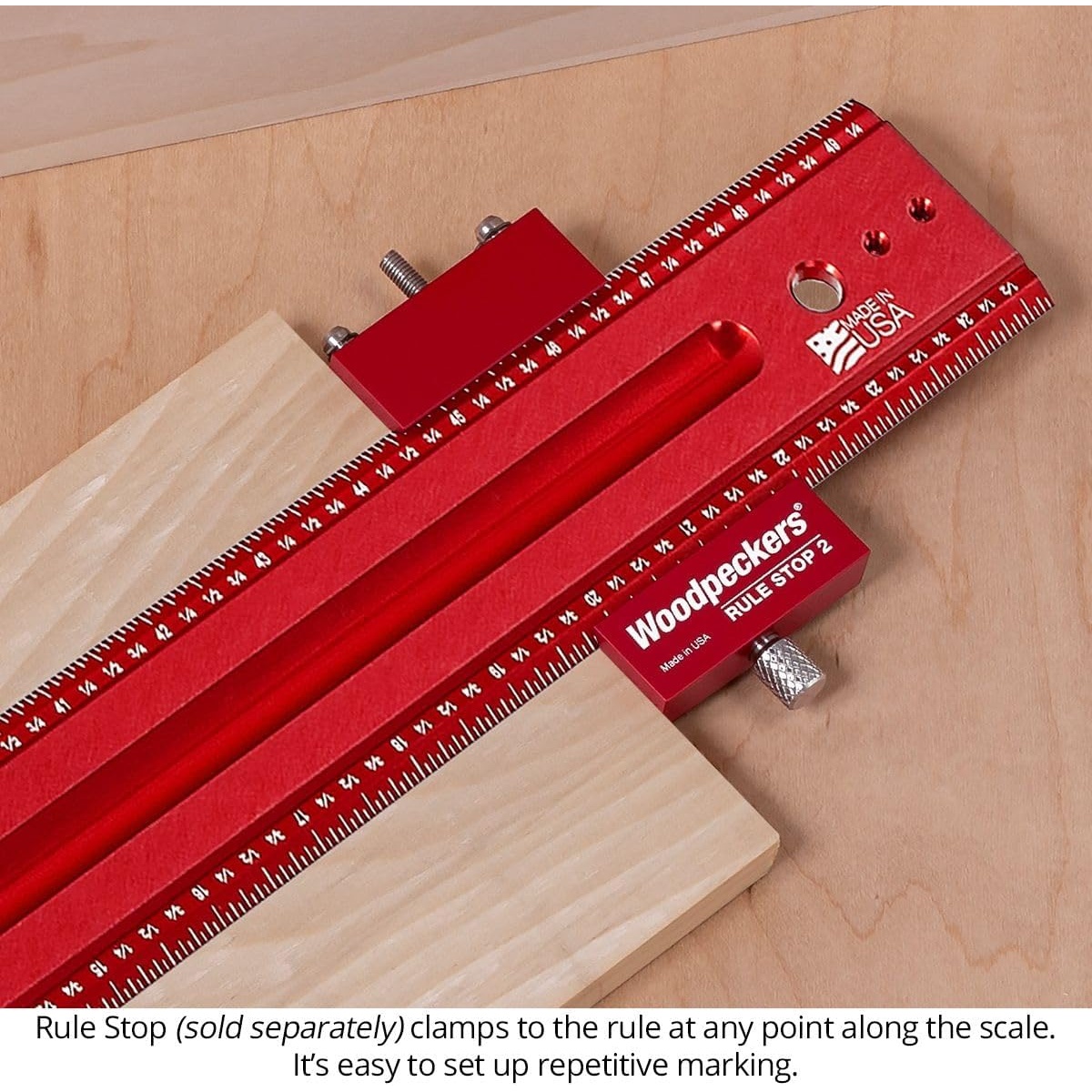 Woodpeckers RS-2 Rule Stop clamped to a woodworking rule for repetitive marking on wood stock at a workbench