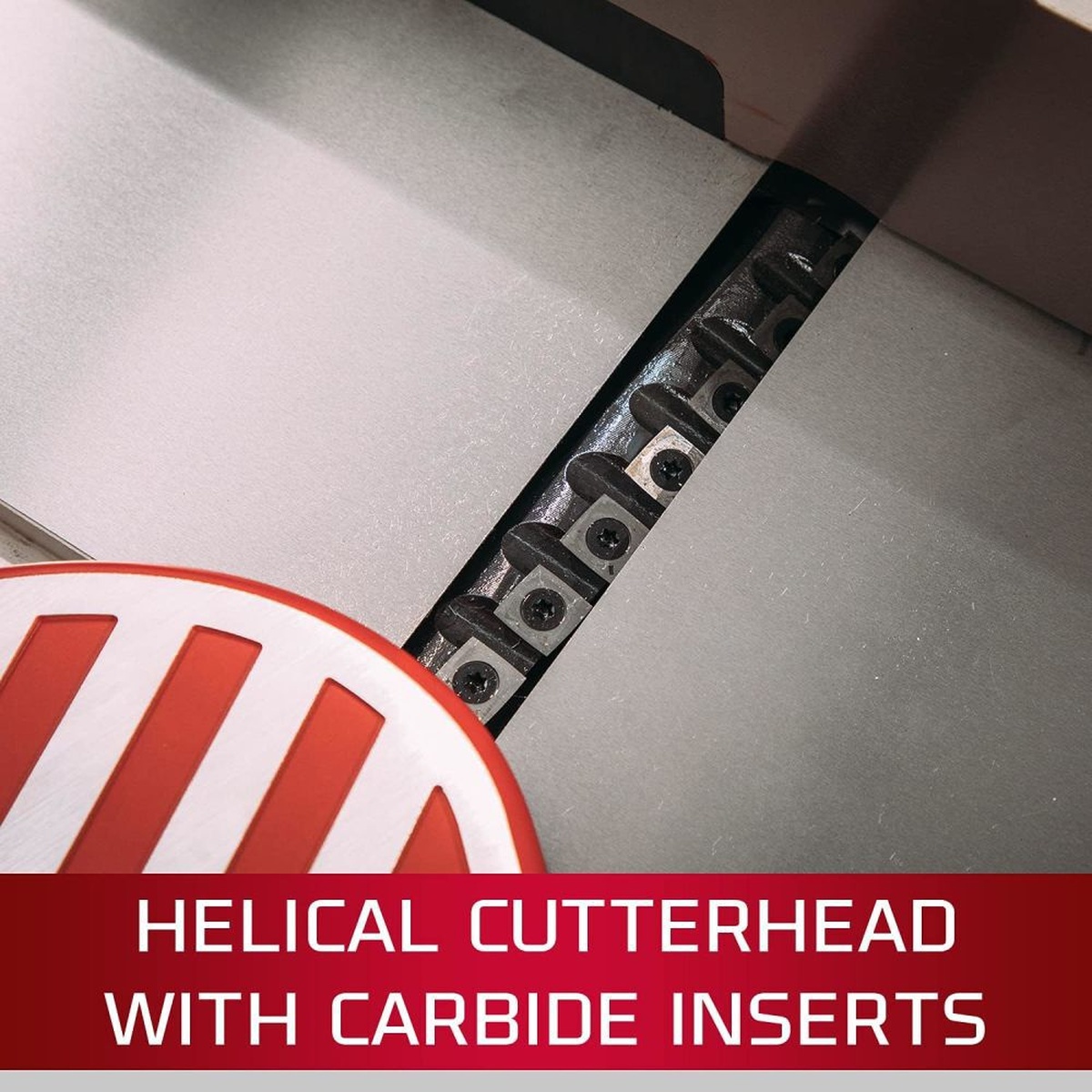 Jet 708466DXK JJ-6HHDX 6 inch long bed jointer helical cutterhead with carbide inserts set between cast iron tables for woodworking stock preparation in a shop