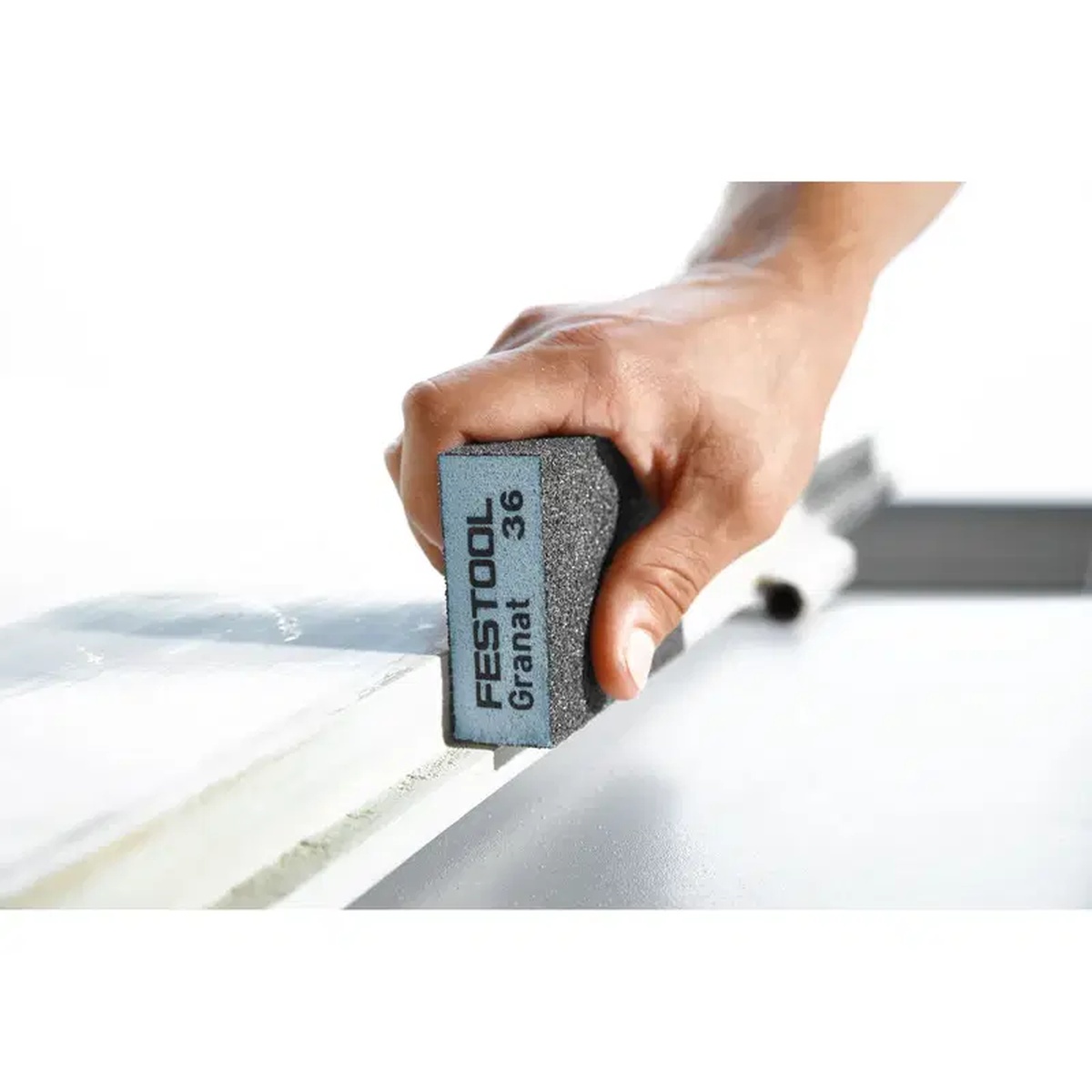 Festool 201081 Granat Abrasive Sanding Block used for hand sanding an edge on a trim or panel surface during detail sanding work