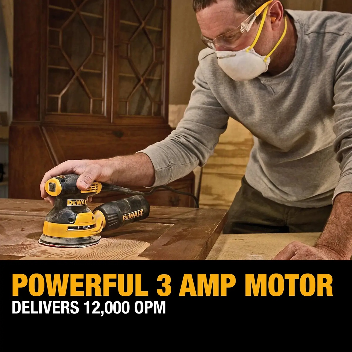 DEWALT DWE6421K 5 in. Single Speed Random Orbit Sander Kit sanding a wood tabletop during finish prep in a workshop