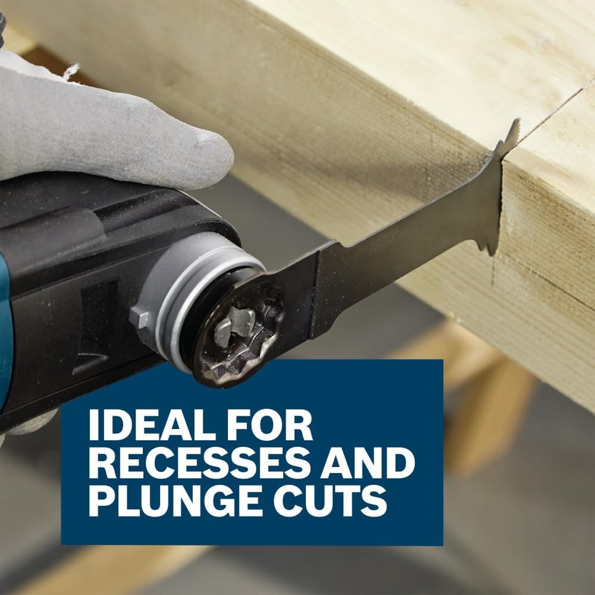 Bosch OSM114F 1-1/4 In. StarlockMax Bi-Metal Plunge Cut Blade cutting a recess in wood with an oscillating multi-tool on a jobsite