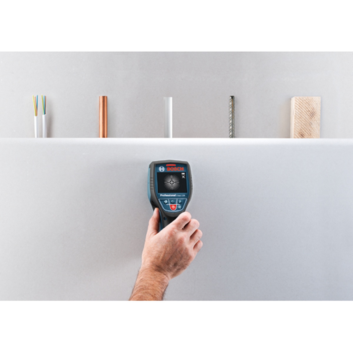 Bosch D-Tect 120 Wall/Floor Scanner checking a finished wall for hidden wiring, pipe, metal, and wood before drilling during remodeling work