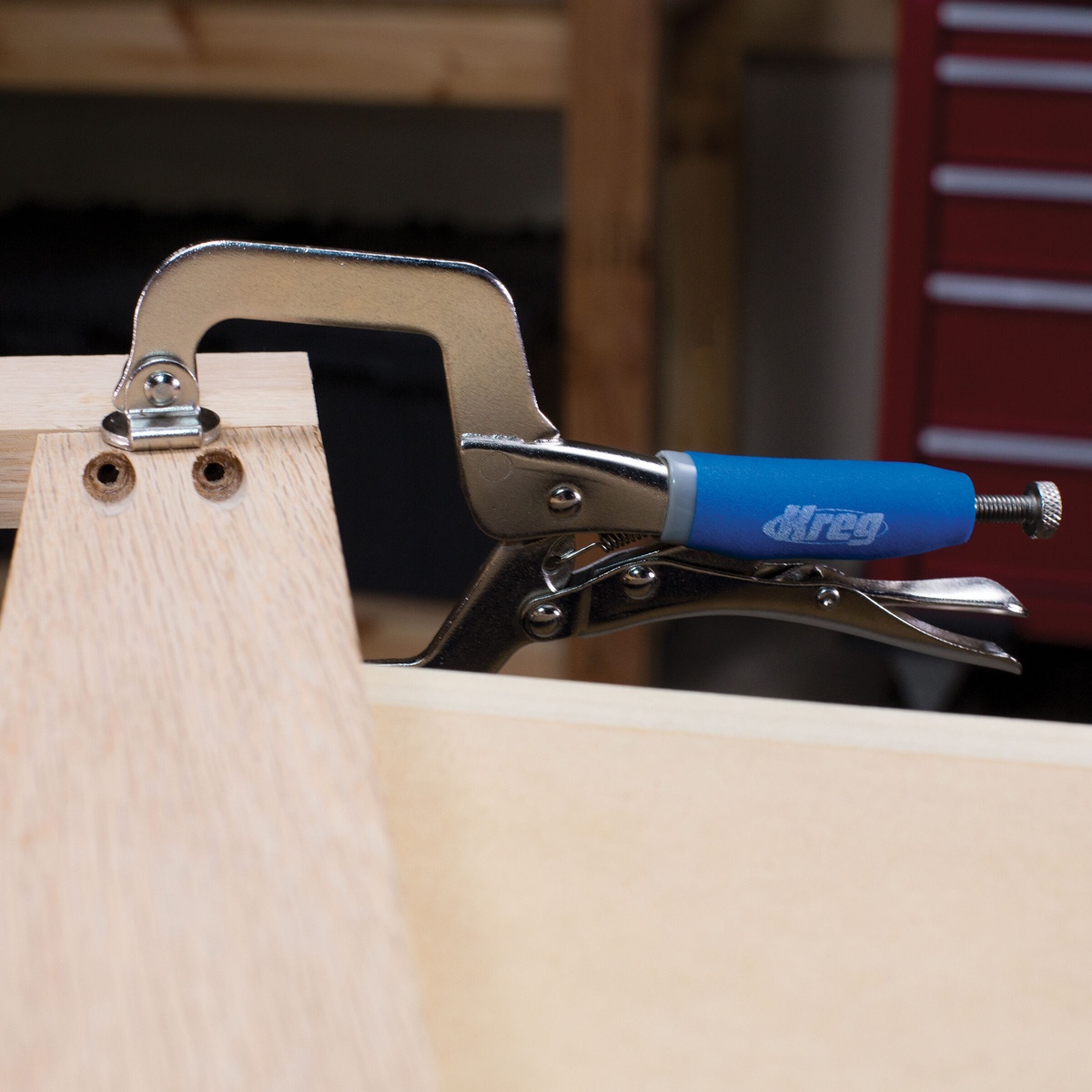 Kreg Tool KHC-MICRO Classic 2 inch Face Clamp securing a pocket-hole woodworking joint in a tight assembly area