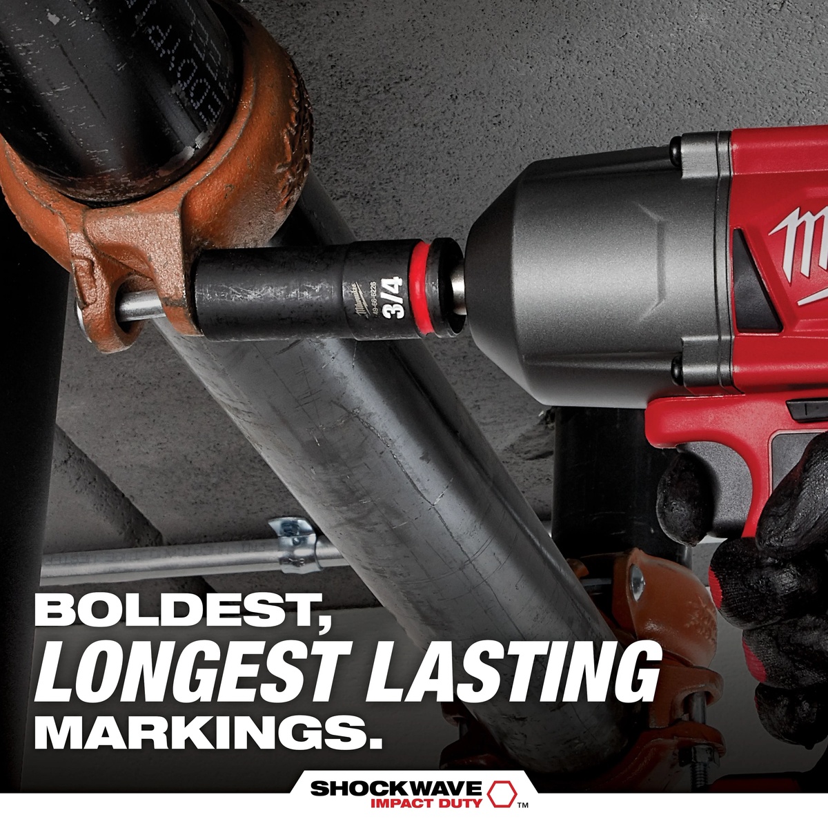 Milwaukee SHOCKWAVE Impact Duty 3/4 Inch Drive 6 Point Socket Set used on steel pipe hardware with a 3/4 inch drive impact wrench in an industrial fastening application
