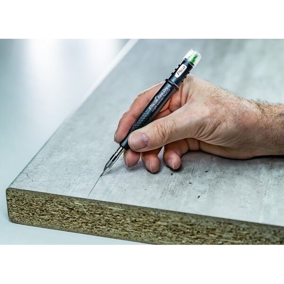 Pica Fine Dry 7050/SB Graphite Lead H SB, 0.9 used for fine layout marking on a smooth sheet material in a workshop setting