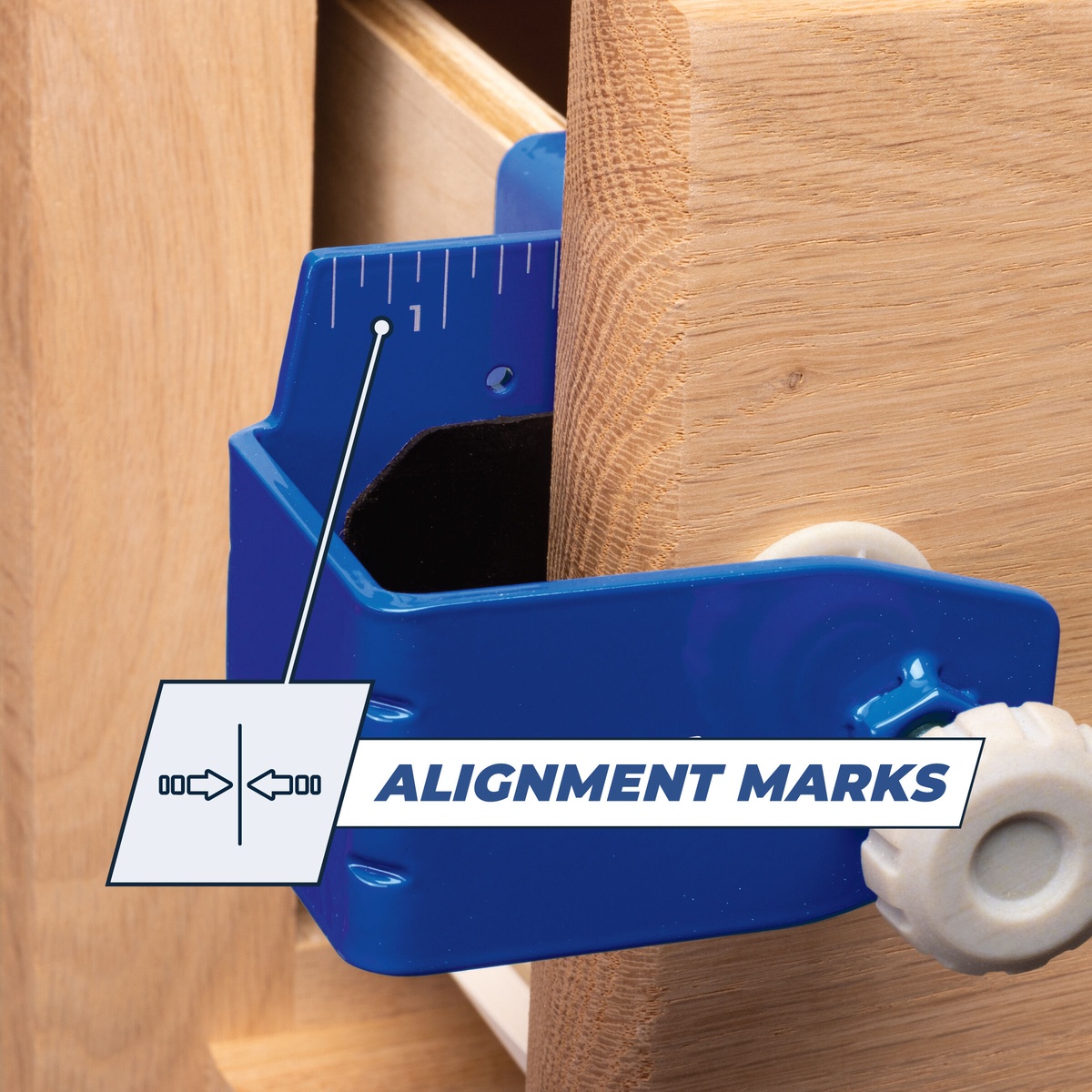 Kreg Tool KCS-DFMT Drawer Front Mounting Jig clamped on a cabinet drawer front during cabinet installation for alignment and reveal setup