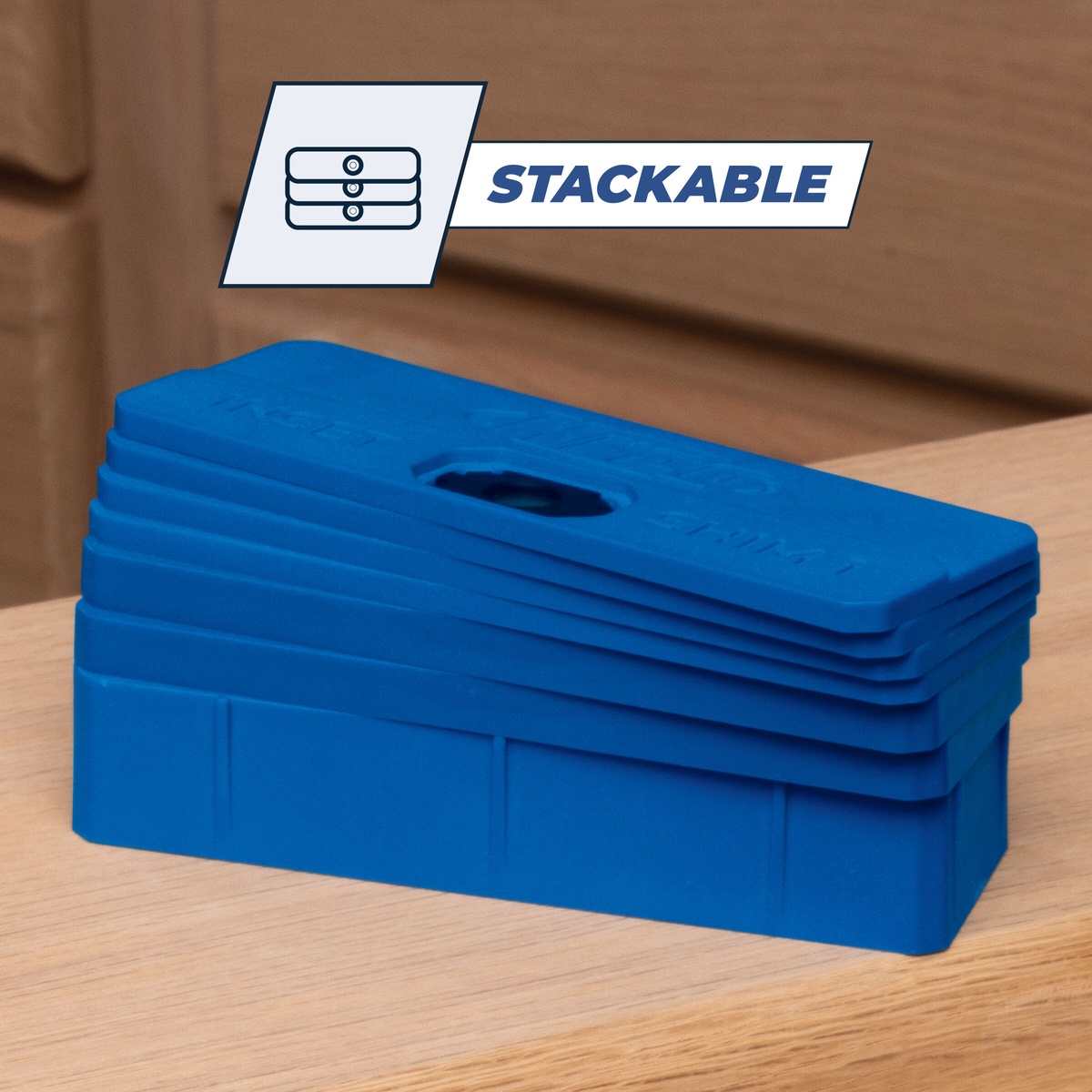 Kreg Tool KCS-SHIMS Setup and Spacer Shims stacked for cabinet door and drawer spacing on a wood cabinet installation surface