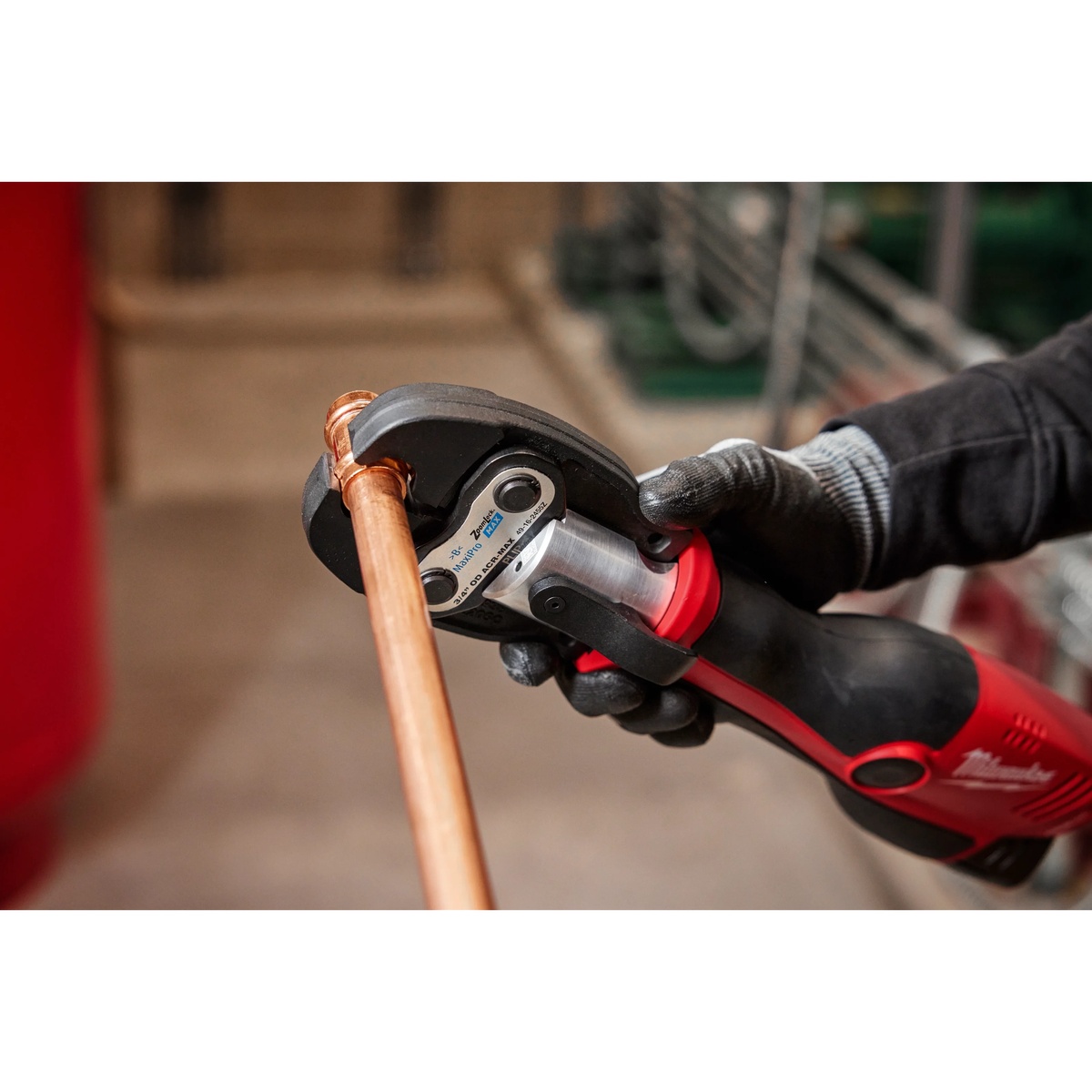 Milwaukee 7/8 in. ZoomLock MAX Press Jaw for M12 FORCE LOGIC Press Tools making a press connection on ACR copper tube during HVAC installation work