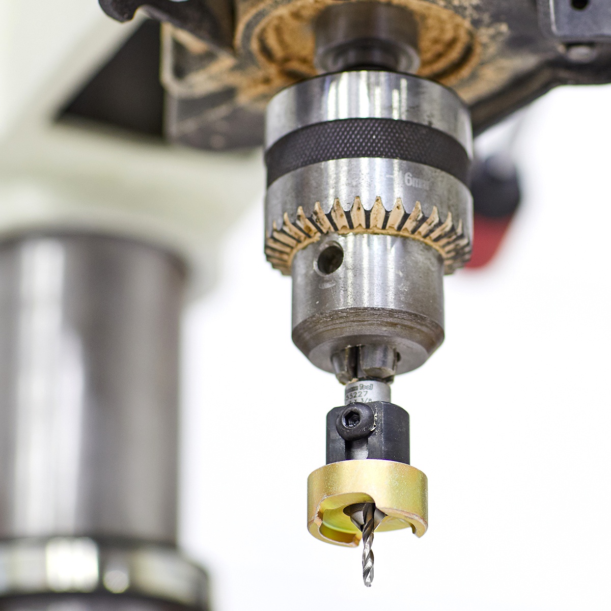 Amana Tools 55227 Carbide Tipped 82 Degree Countersink with Adjustable Depth Stop and No-Thrust Ball Bearing installed in a drill press for repeatable countersinking on woodworking projects in a shop