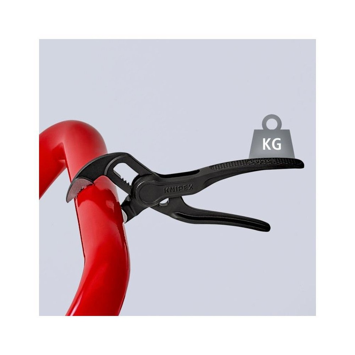 Knipex 87 00 100 SBA 4 in. Cobra XS Water Pump Pliers gripping curved red pipe in a maintenance application