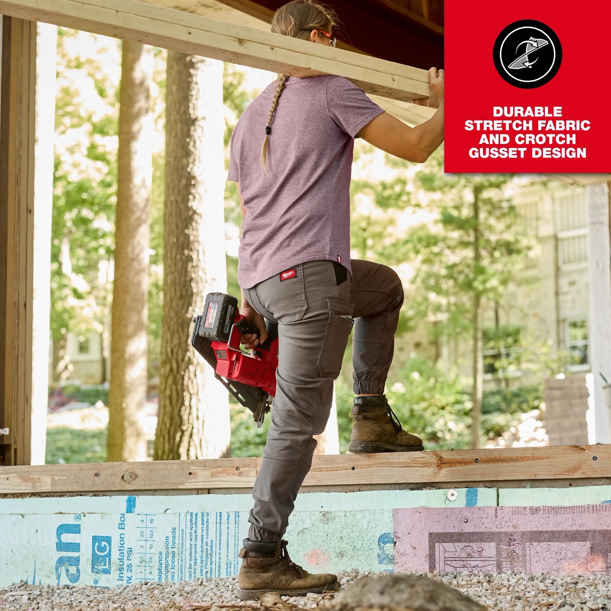 Milwaukee Women's GRIDIRON Double Knee Jogger Pants - Brown 12 used on a jobsite while carrying tools and climbing onto a framed structure