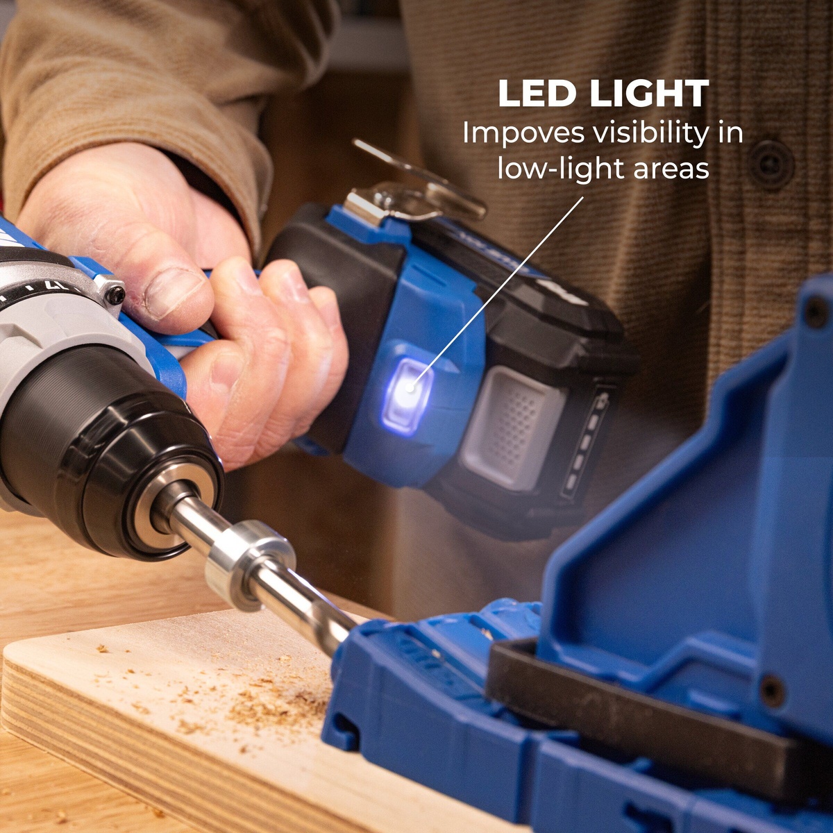 Kreg 20V Ionic Drive Compact Drill driving into wood with LED light illuminating the work area