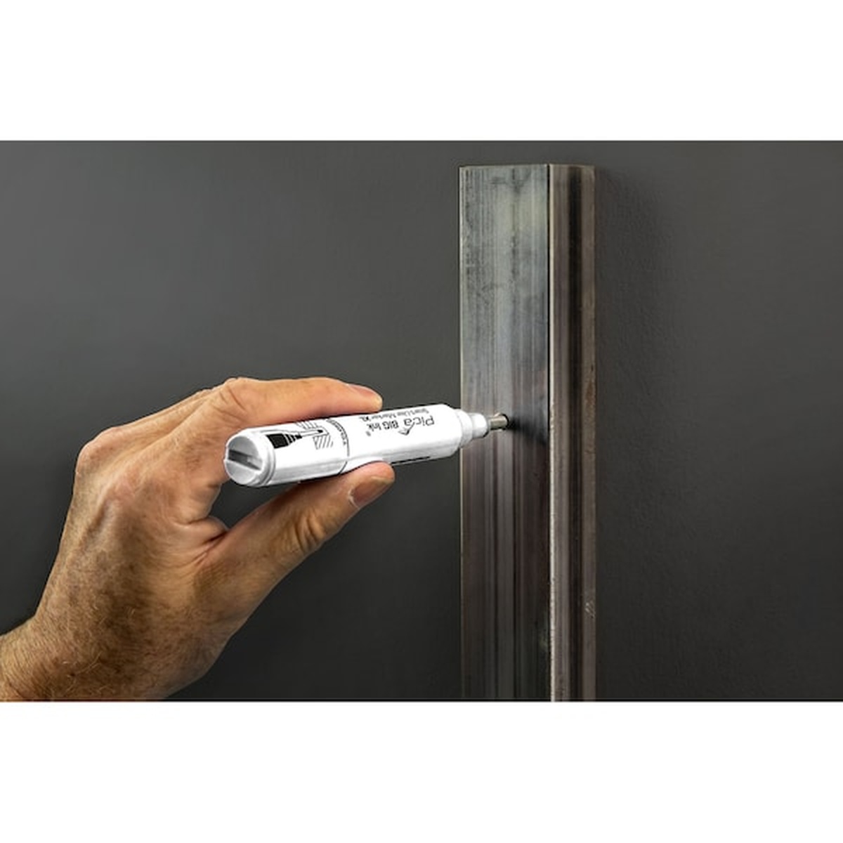 Pica Big Ink Smart-Use Marker XL white marking inside a metal channel during installation work