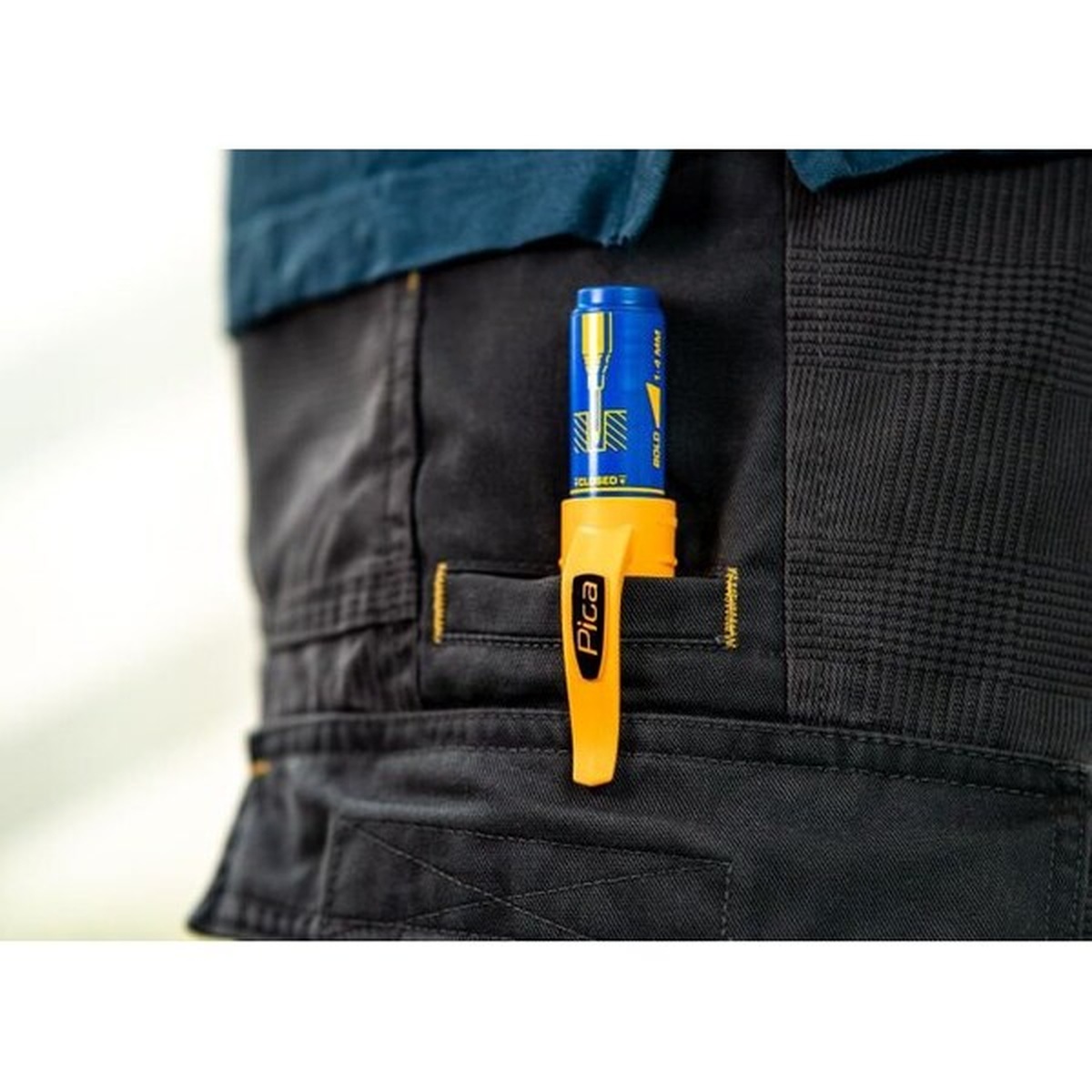 Pica 170/41/SB Blue Ink Marker For Deep Hole clipped in a work pocket with quiver holder for jobsite carry