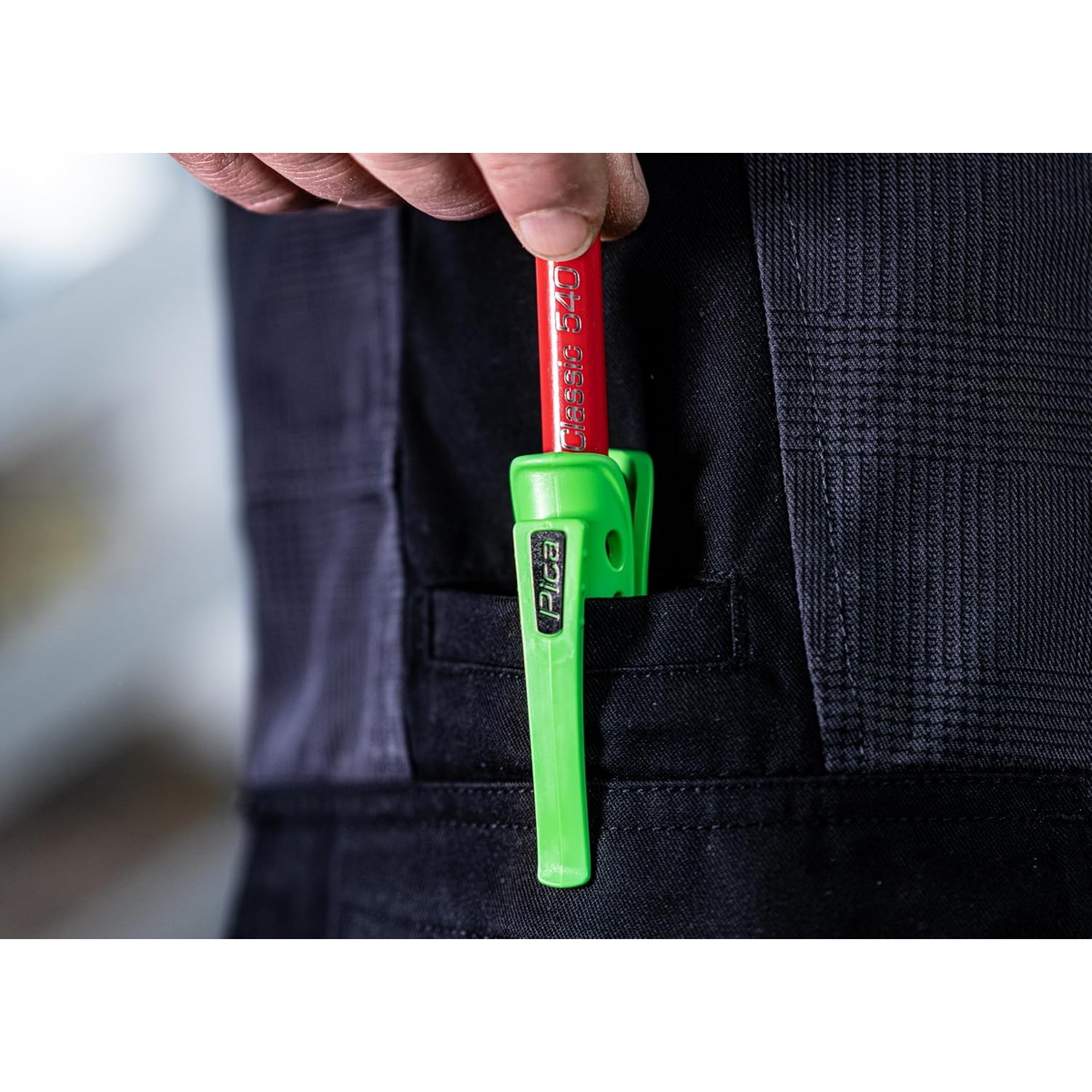 Pica 505/02 Pica Pocket and carpenter pencil clipped into a workwear pocket for quick jobsite marking access