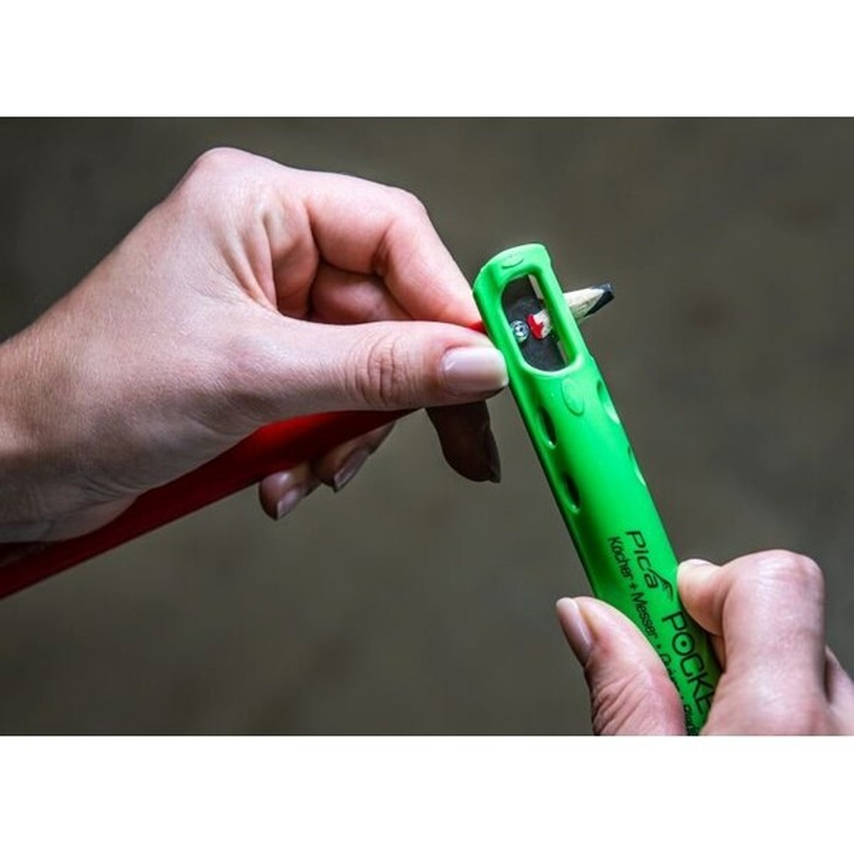 Pica Dry Pica Pocket holder built-in sharpener sharpening the universal graphite marking pencil during jobsite use
