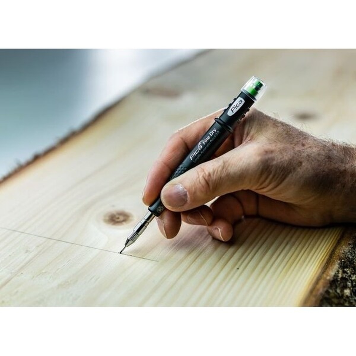 Pica Dry 7030 Fine Dry Set of 24 HB Graphite Refill Leads used in a Pica Fine Dry marker for precise layout marking on smooth wood in a workshop setting