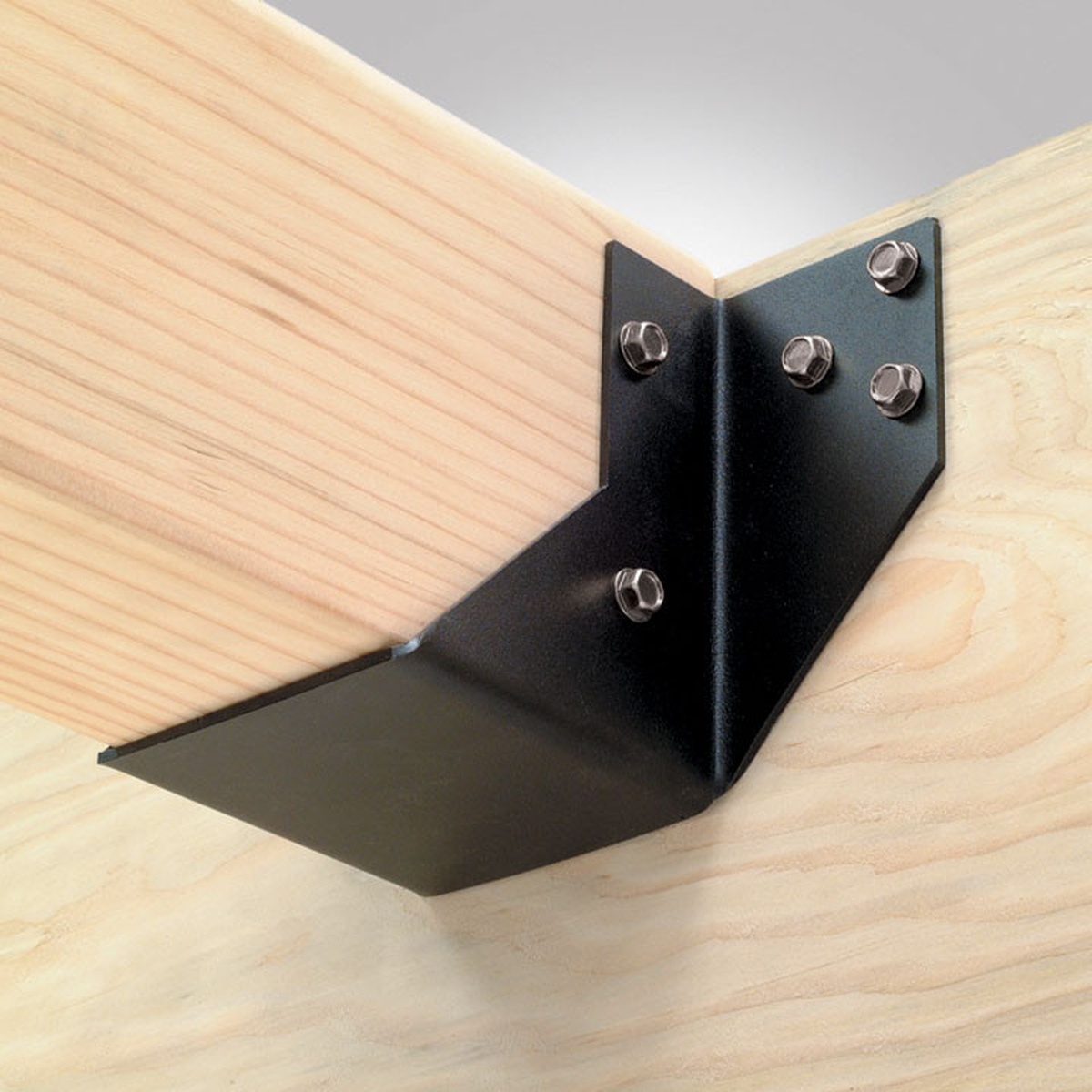 Simpson Strong-Tie SDS25600 Strong-Drive SDS Heavy-Duty Connector Screw securing an ornamental joist hanger to wood framing