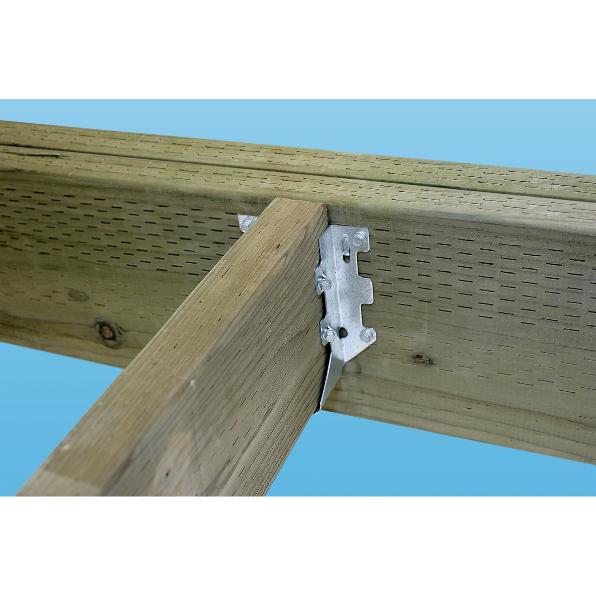 Simpson Strong-Tie LUS24Z face-mount joist hanger fastened to a wood header with connector screws during 2x4 framing installation