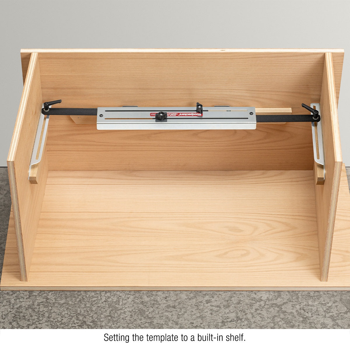 Woodpeckers Stair Tread Template Tool set between cabinet walls to capture a built-in shelf opening for woodworking layout and custom shelf fitting