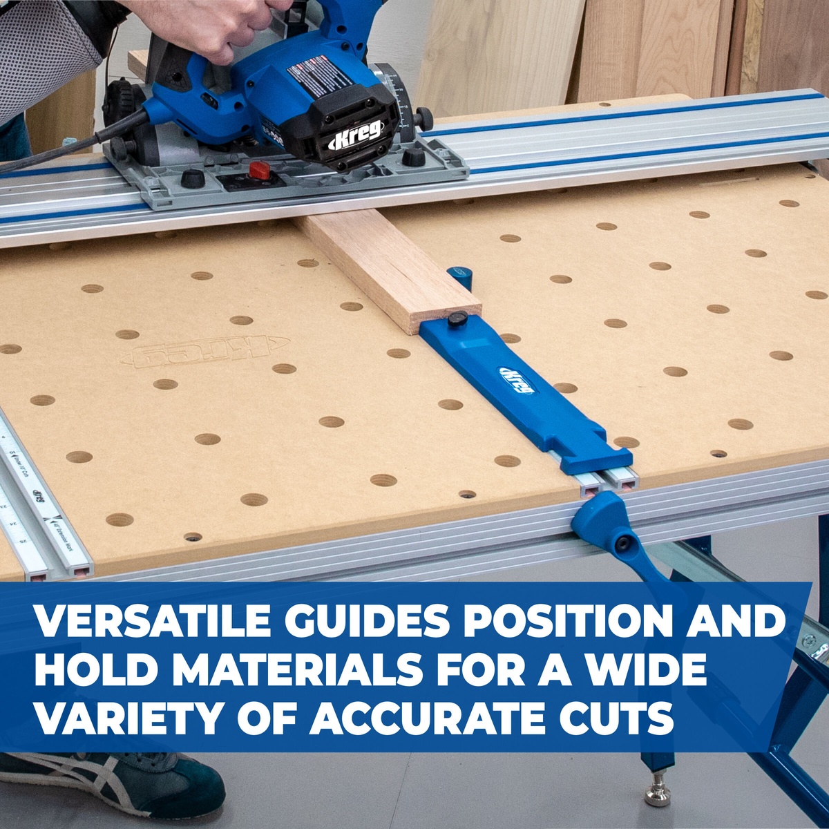 Kreg ACS1000 Adaptive Cutting System Project Table Kit supporting a guided crosscut on a wood board with a plunge saw and guide track in a workshop cutting setup