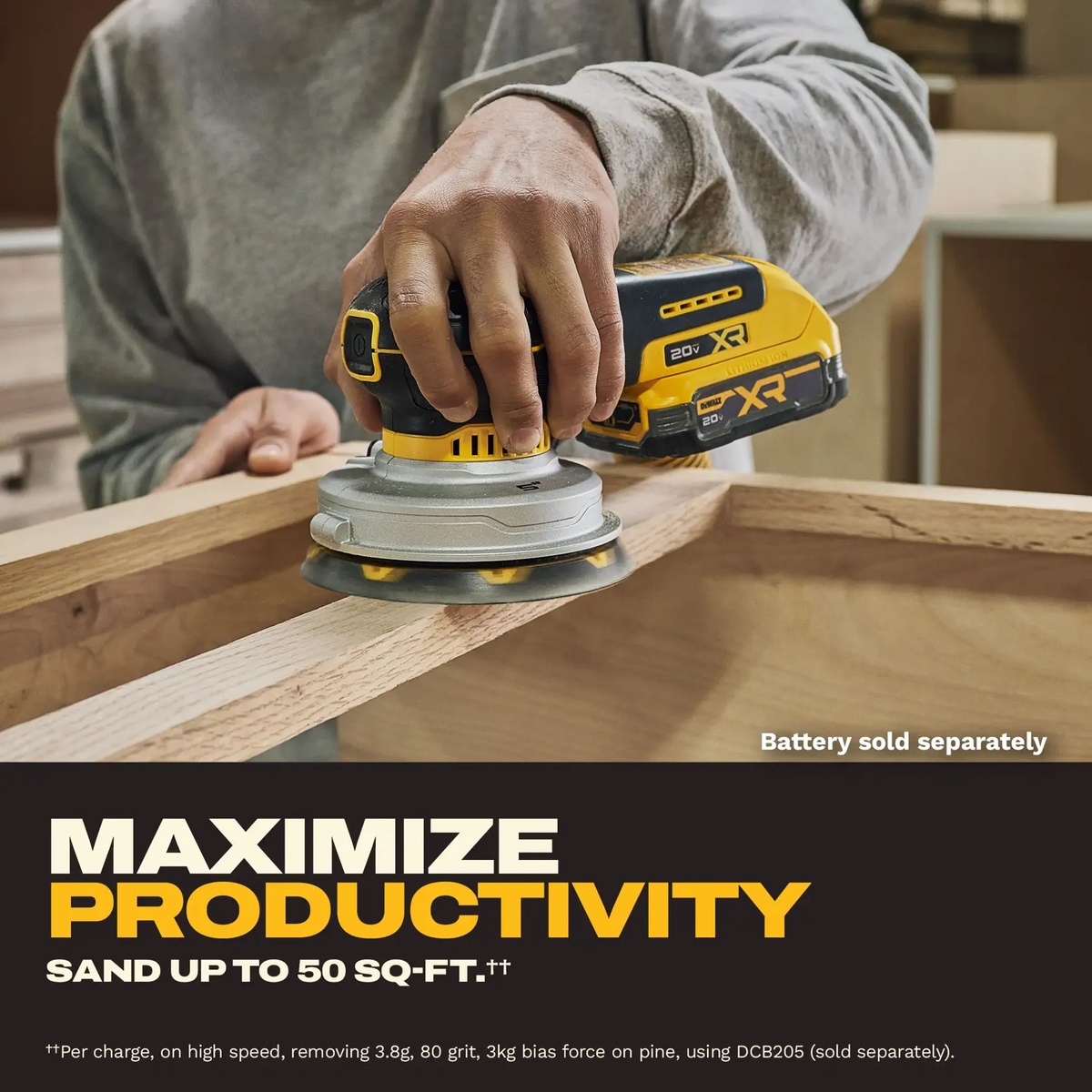 DEWALT DCW211B 20V XR 5-in Random Orbit Sander sanding a wood frame during cabinet or furniture assembly