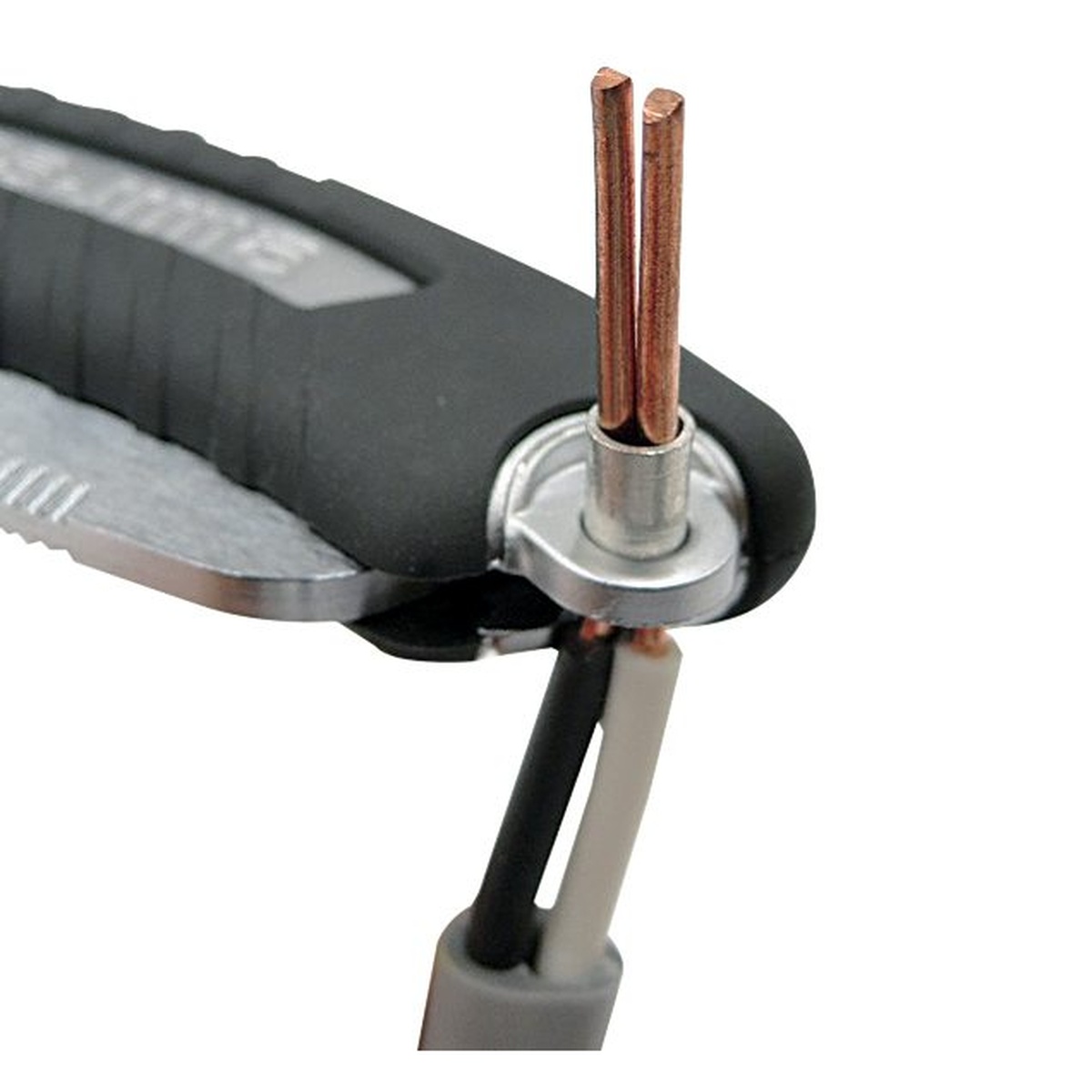 Tajima VARIX Folding Compact Knife slitting insulated electrical cable with the blade guided along the jacket during electrician work