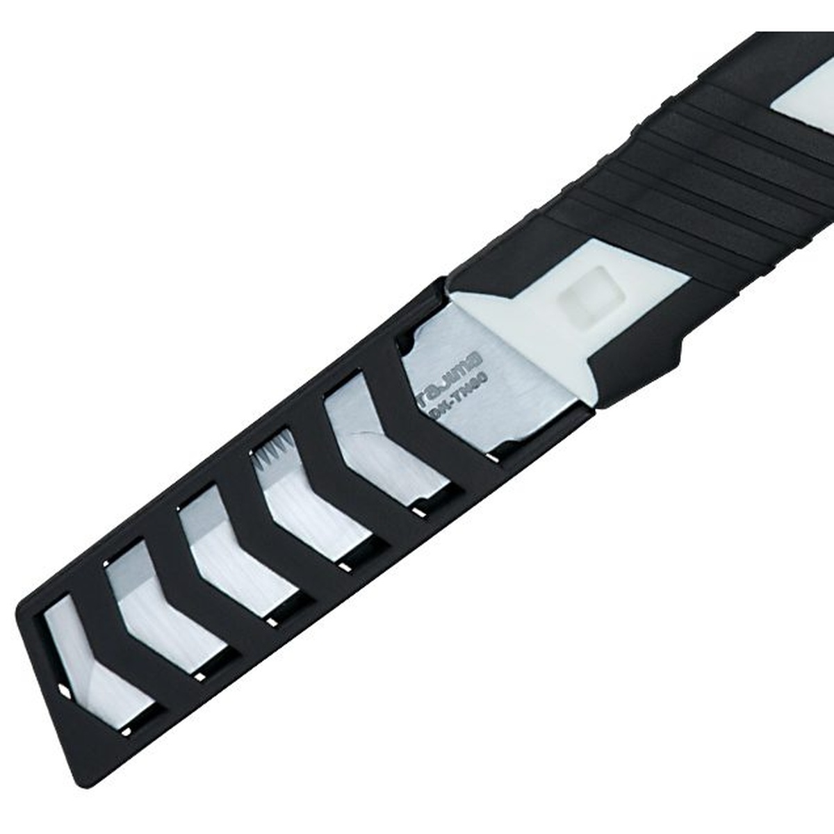 Tajima chisel knife seated in the included blade protector for safer carry and storage on an electrician tool kit