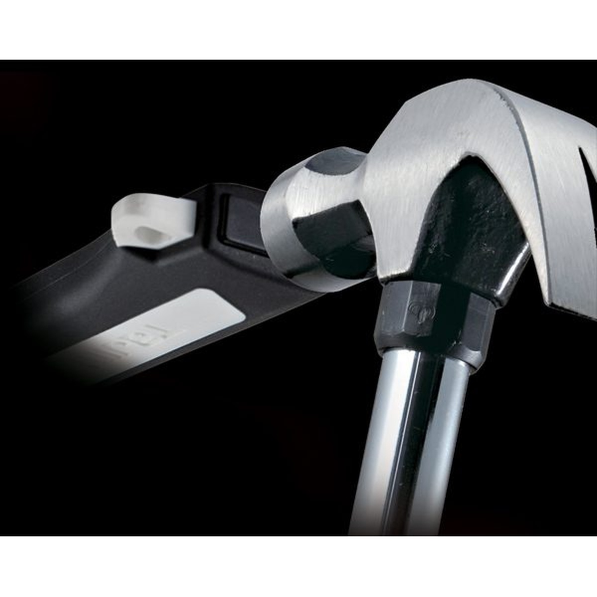 Tajima VARIX Chisel Knife hammer-ready end cap being struck with a hammer during jobsite chisel-style use