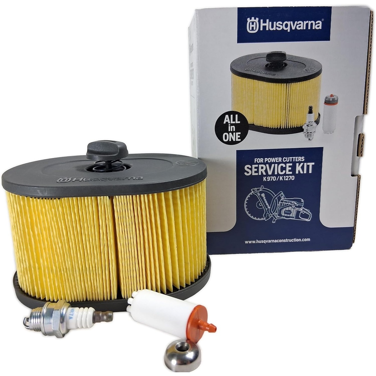 Husqvarna 546903002 Service Kit with air filter, spark plug, and fuel filter shown in front of the box for K970 and K1270 power cutter maintenance