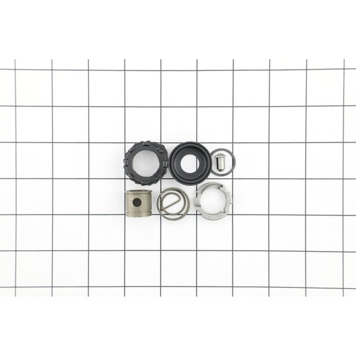 Milwaukee 14-46-1062 Blade Clamp Kit replacement reciprocating saw parts laid out for repair of a Milwaukee Sawzall blade clamp assembly