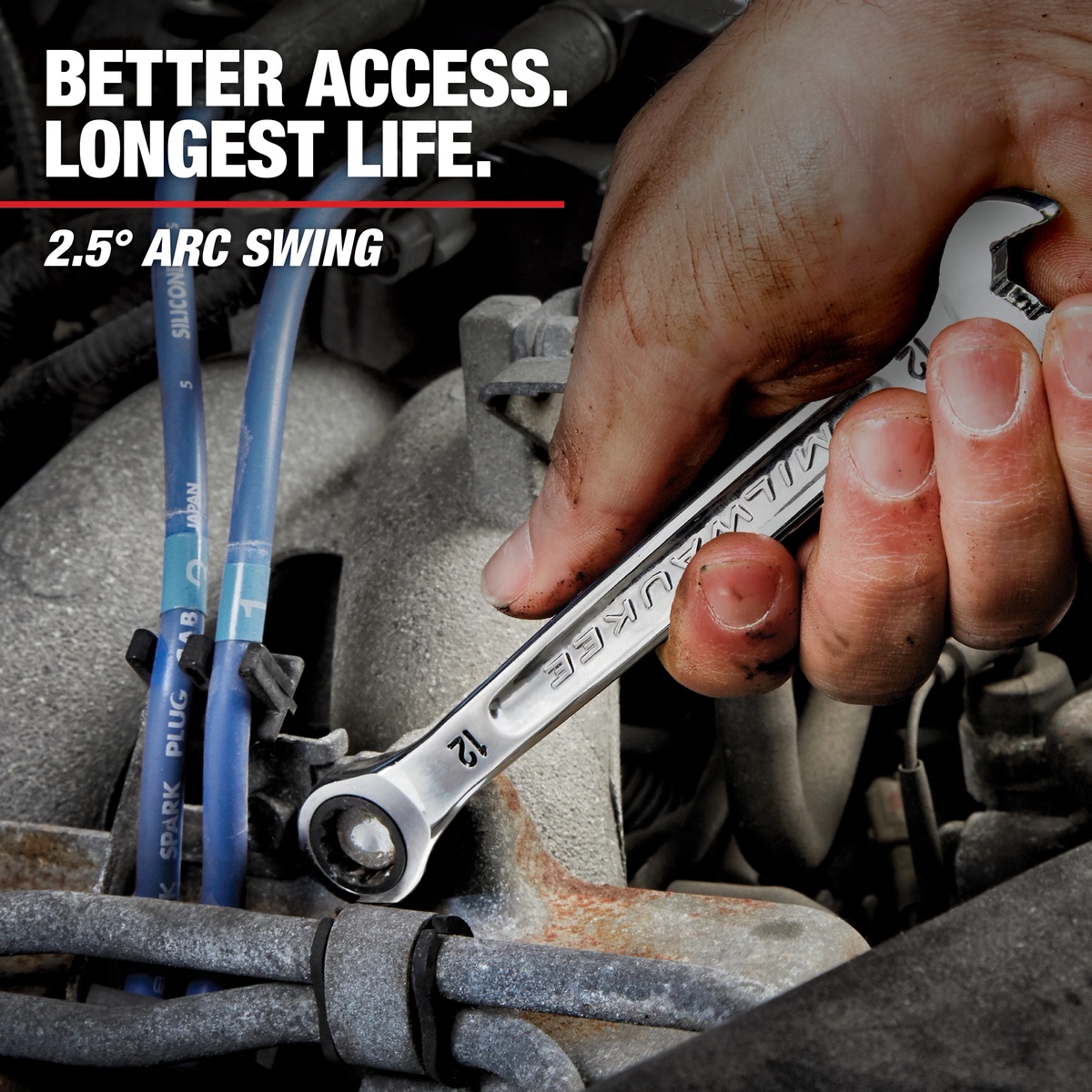 Milwaukee 9/16 in. SAE Ratcheting Combination Wrench turning a fastener in a tight engine bay during automotive service