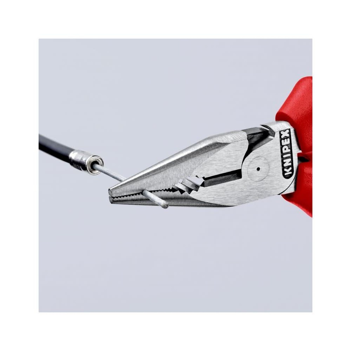 Knipex Needle Nose Combination Pliers 145mm cutting or holding control wire in a repair setting, showing the compact jaws and cutting area close to the pivot