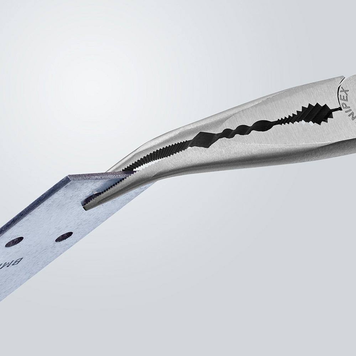 Knipex 28 81 280 SBA Extra Long Reach Angled Long Nose Pliers holding a thin metal tab in a precision close-up, showing the slim tip and milled gripping area used for careful assembly and adjustment work