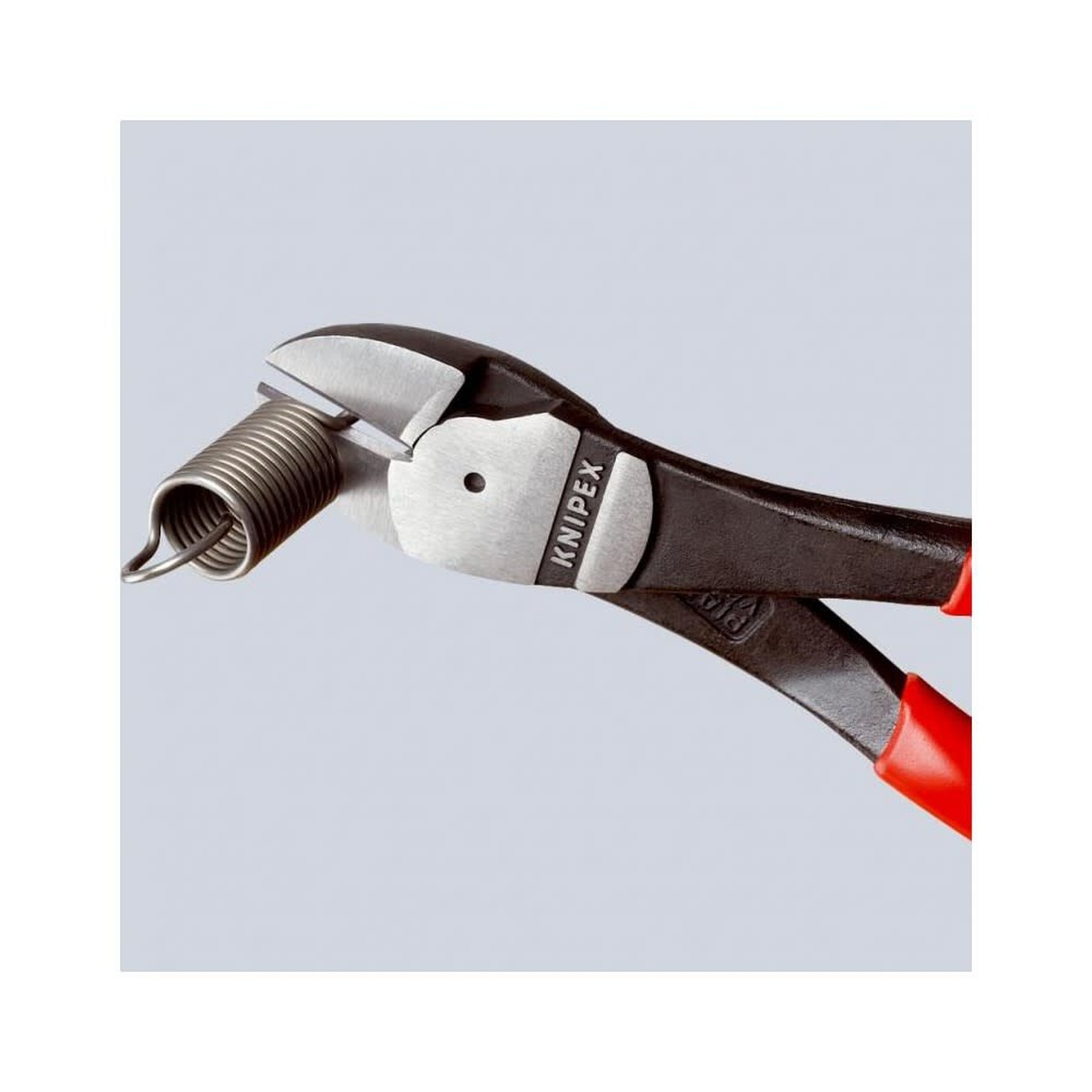 Knipex High Leverage Diagonal Cutter 180mm cutting coiled wire in a close-up bench work setting