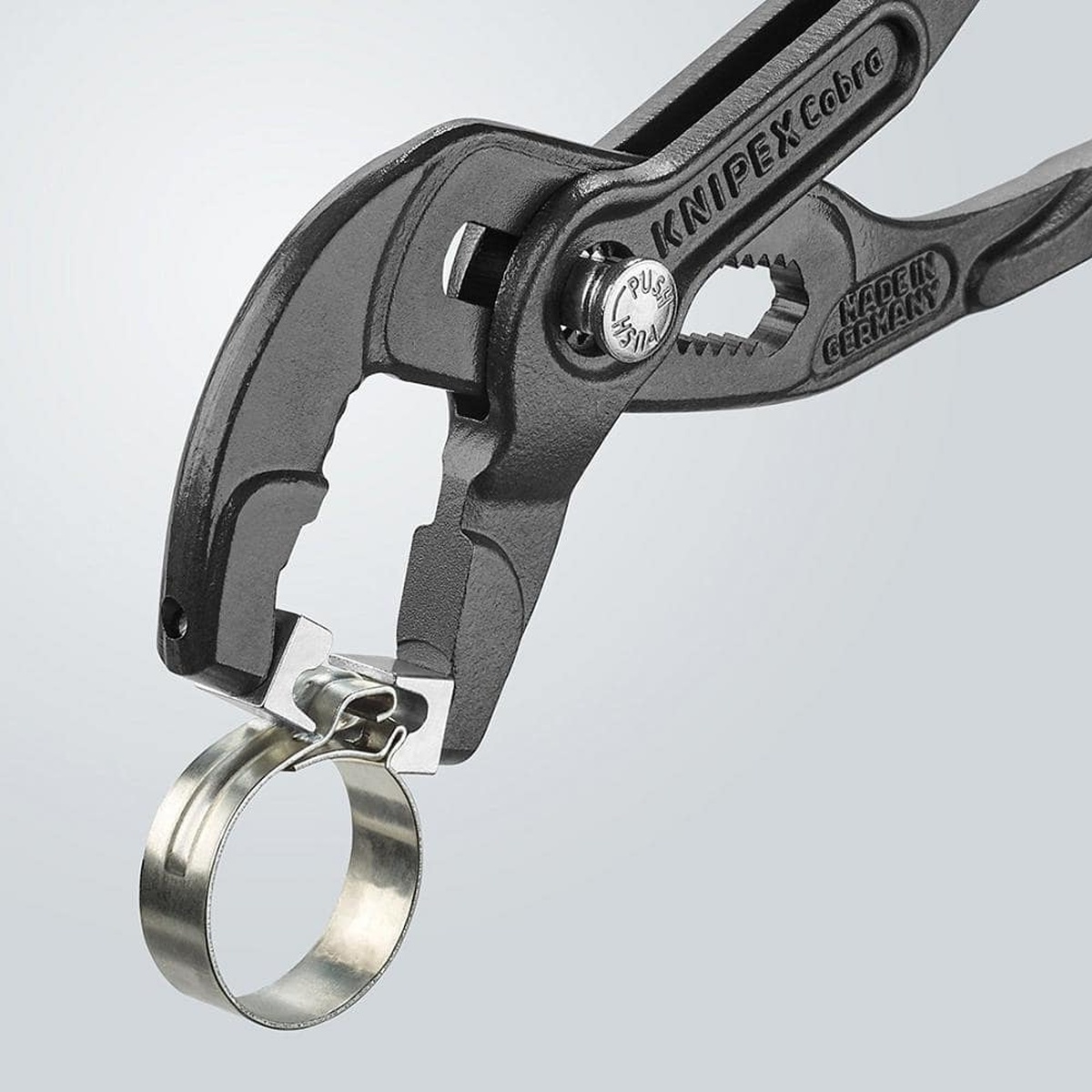 Knipex 85 51 250 C SBA 10 in. hose clamp pliers gripping a metal click clamp during hose service work