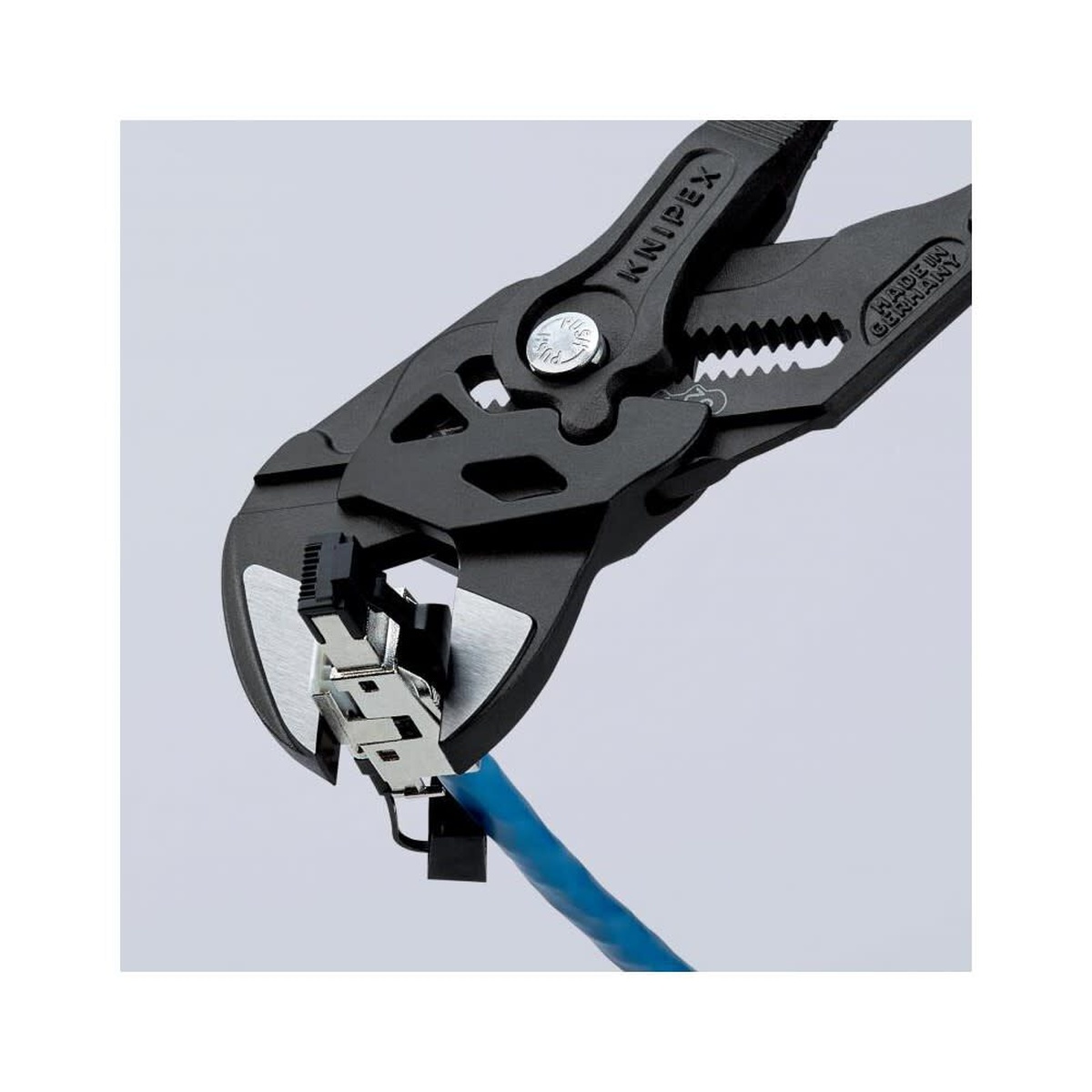 Knipex Adjustable Pliers Wrench 250mm close-up on a small electrical fitting showing the parallel jaws and precise grip