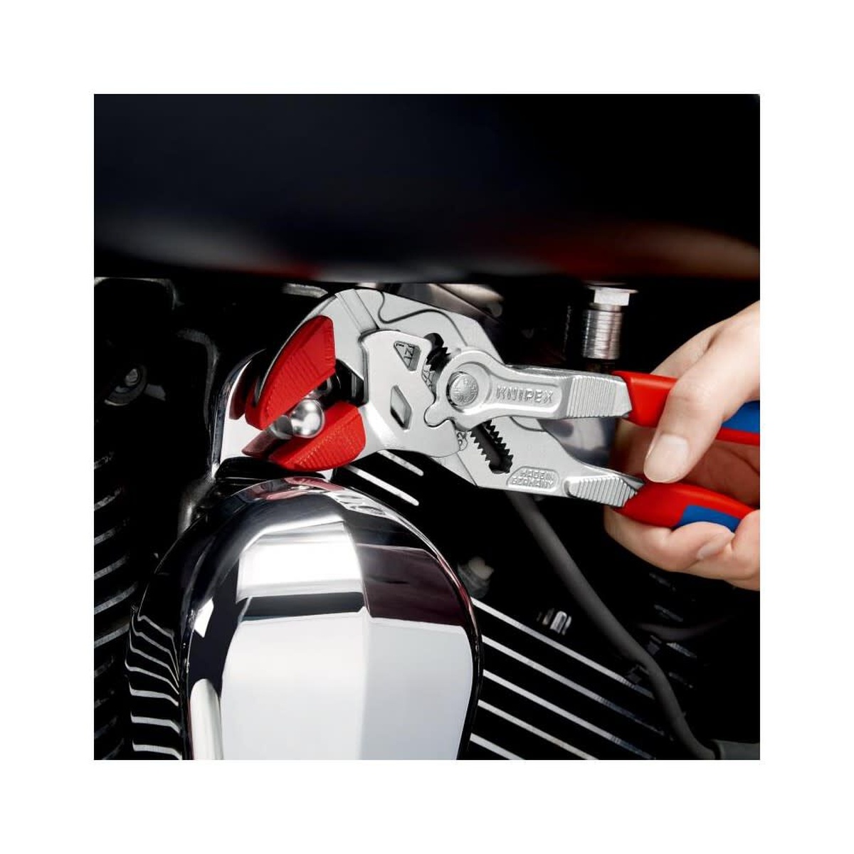 Knipex Pliers Wrench 250mm Chrome Plated Head gripping a chrome motorcycle fitting during maintenance work without marring the finished surface