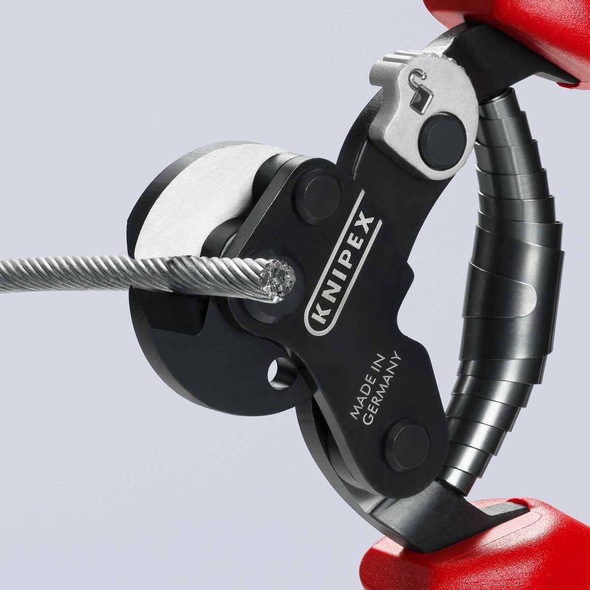 Knipex 95 62 160 SBA wire rope shears cutting stranded wire rope in a close-up shop demonstration