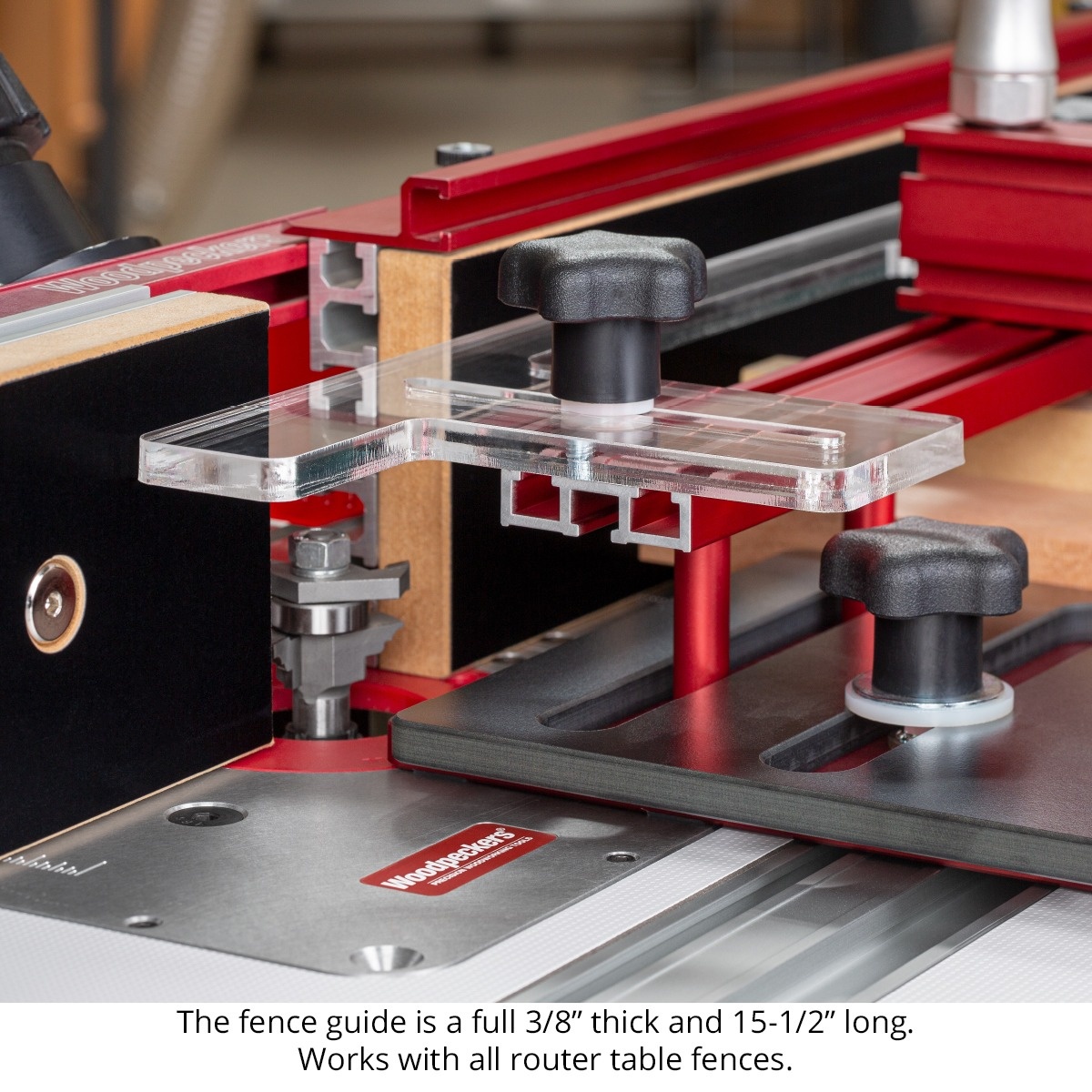 Woodpeckers Iron-Grip Clamp Upgrade fence guide aligned against a router table fence for coping sled use in a woodworking shop