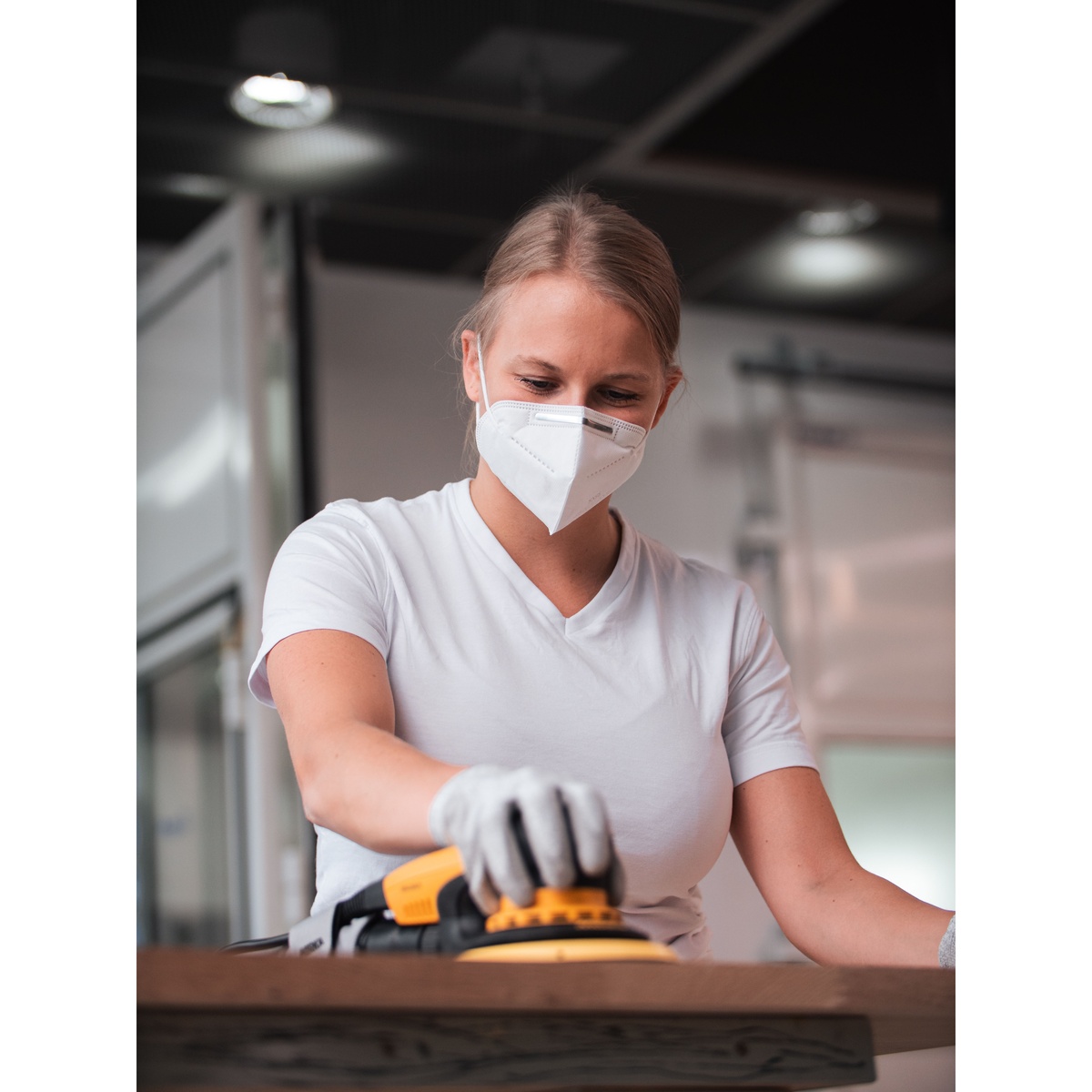 Mirka Abranet Ace HD 8 inch Grip sanding disc used on a sander for woodworking surface preparation on a wood panel