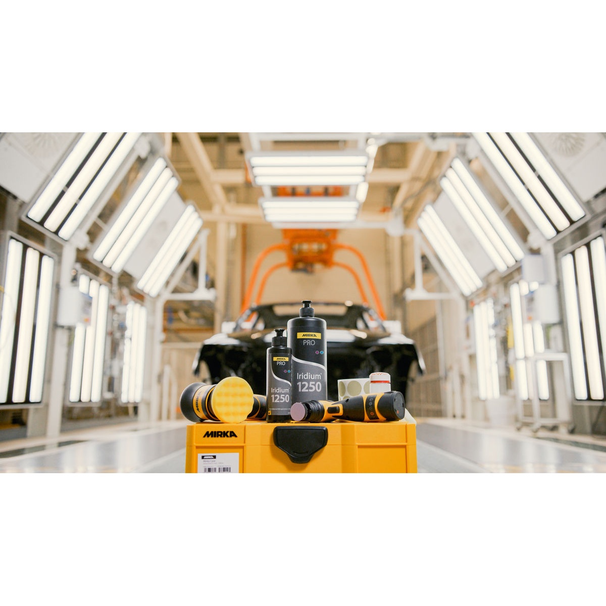 Mirka PRO Iridium 1250 Polishing Compound used in an automotive refinishing environment for polishing painted surfaces during spot repair work