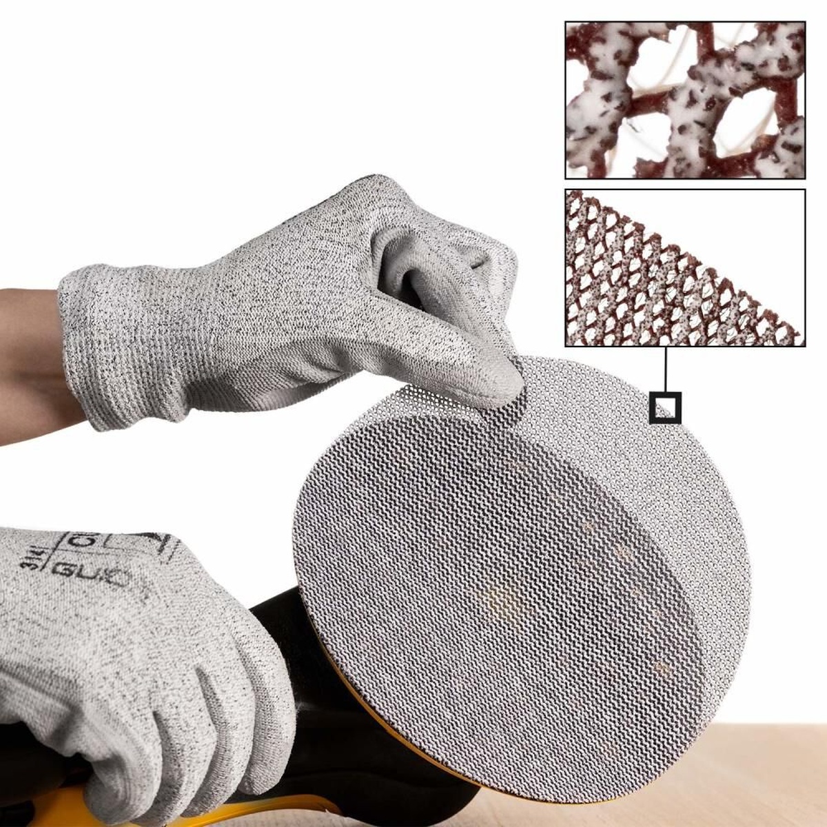 Mirka 6 Inch Maroon Assorted Pack 80-600 Grit Mesh Sanding Disc mounted on a random orbital sander for dust-reduced sanding on a work surface in a shop setting