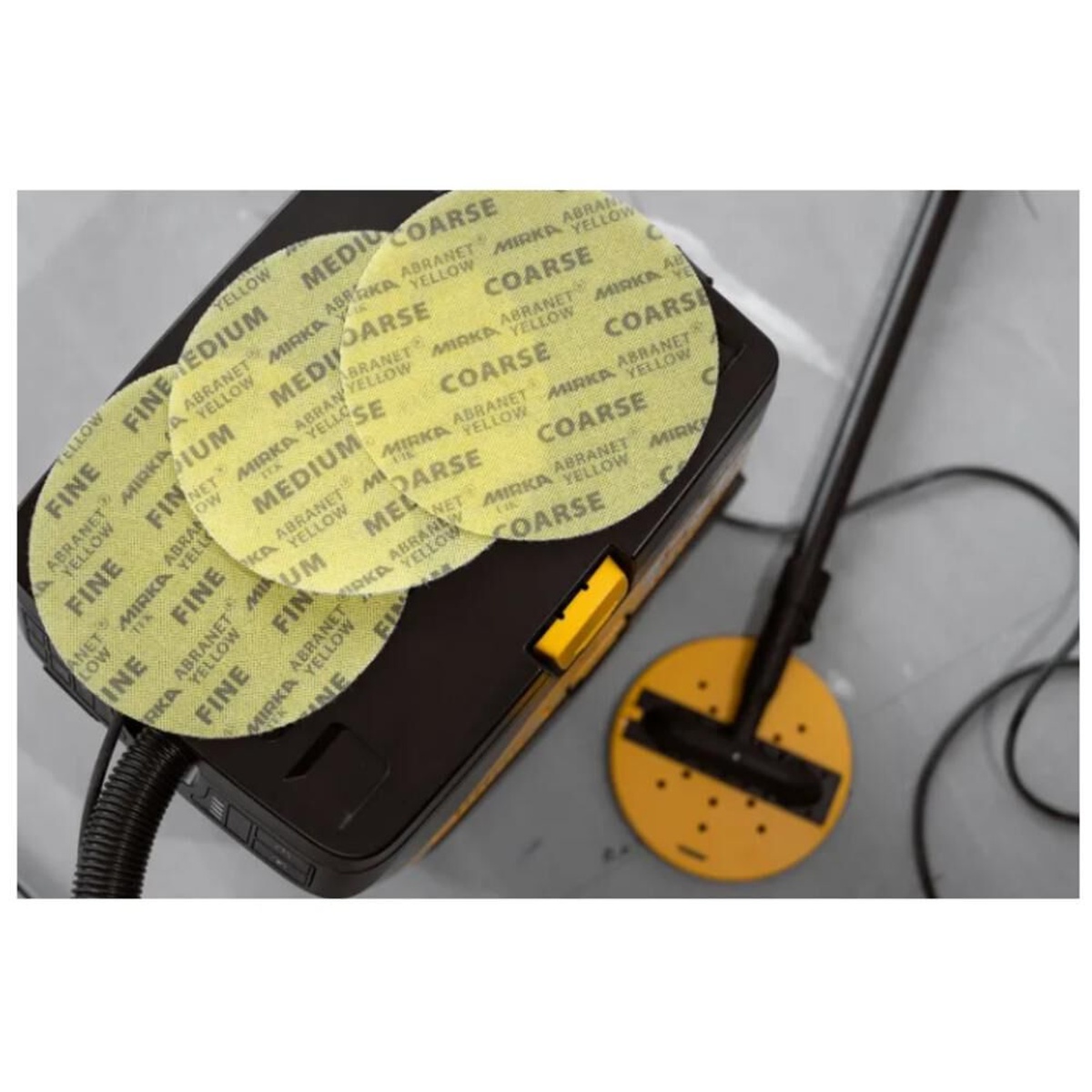 Mirka ABRANET YELLOW 9 Inch Medium Abrasive 20 Pieces discs in multiple grits with a long-neck sander setup for drywall finishing work