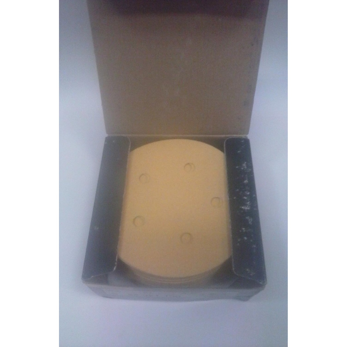 Mirka 23-321-060 Bulldog Gold 5 in. 5-Hole P60 PSA Vacuum Disc stack in box for shop use with a 5 inch PSA sanding pad and dust extraction setup