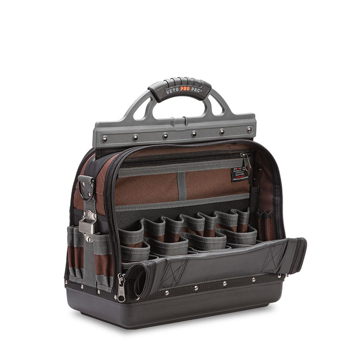 Veto Pro Pac XL Extra Large Tool Bag opened on a work surface showing organized vertical tool pockets for hand tools and service work storage