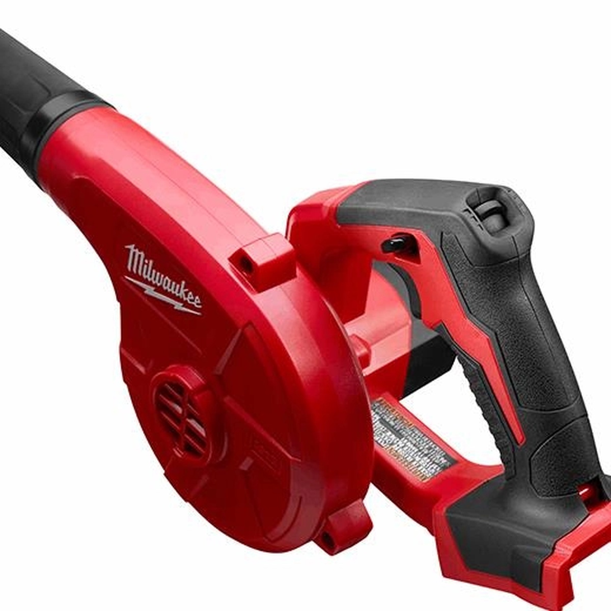 Milwaukee 0884-20 Compact Blower showing the rear handle and trigger controls for handheld jobsite dust cleanup in a workshop setting