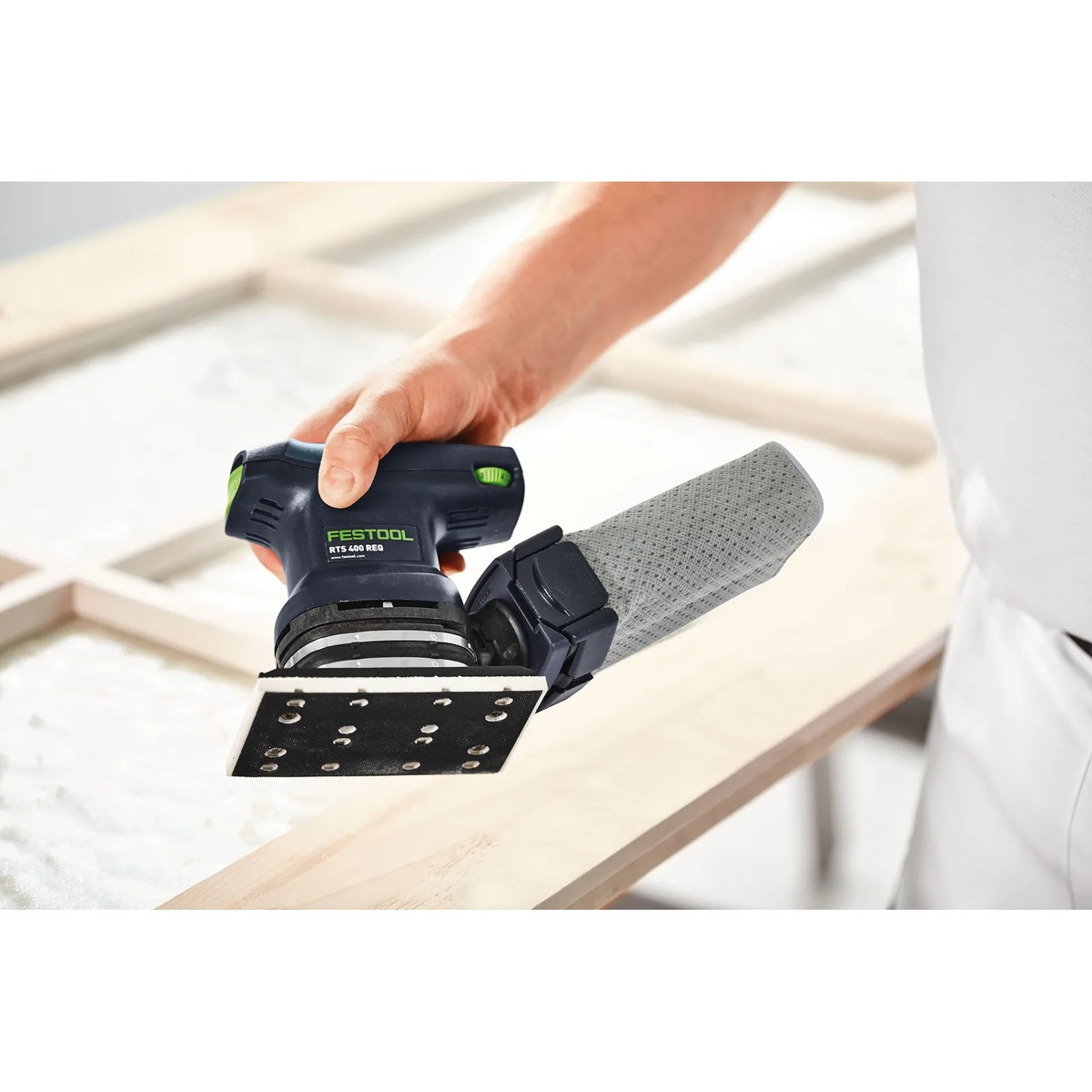Festool 489252 SSH 80x130 sanding pad mounted on an RTS 400 sander while sanding a narrow wood board in a workshop