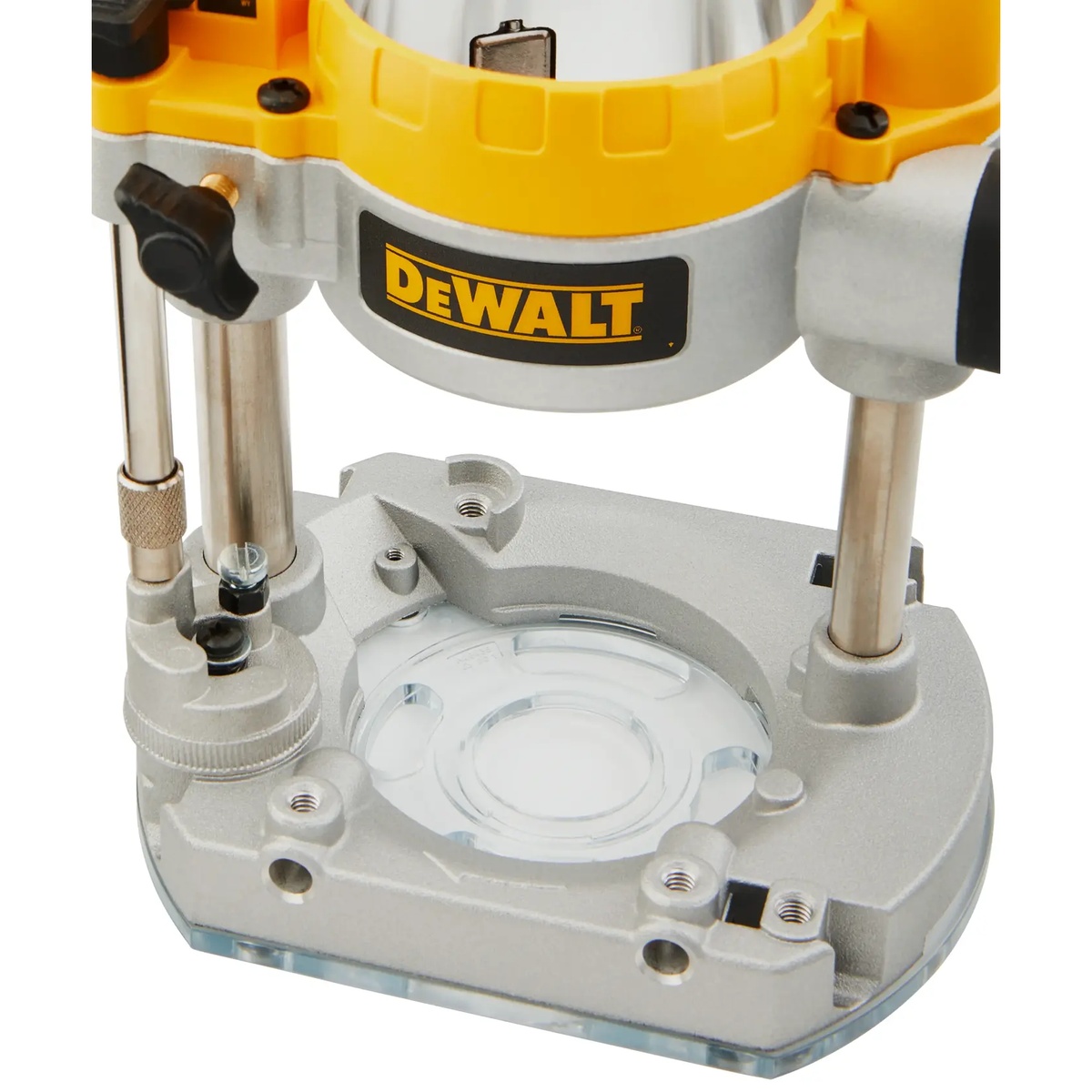 Close-up of the DeWalt DNP612 Plunge Base for Compact Router showing the clear sub-base and guide rod area for template routing and accurate bit visibility on woodworking tasks